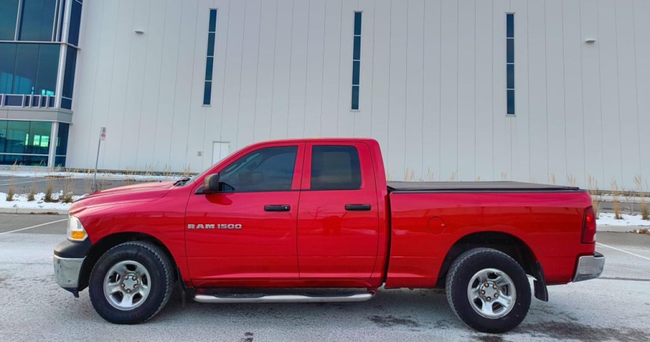 2011 RAM 1500 ST 4dr Quad Cab 4WD SB (4.7L 8cyl 5A) Photo4