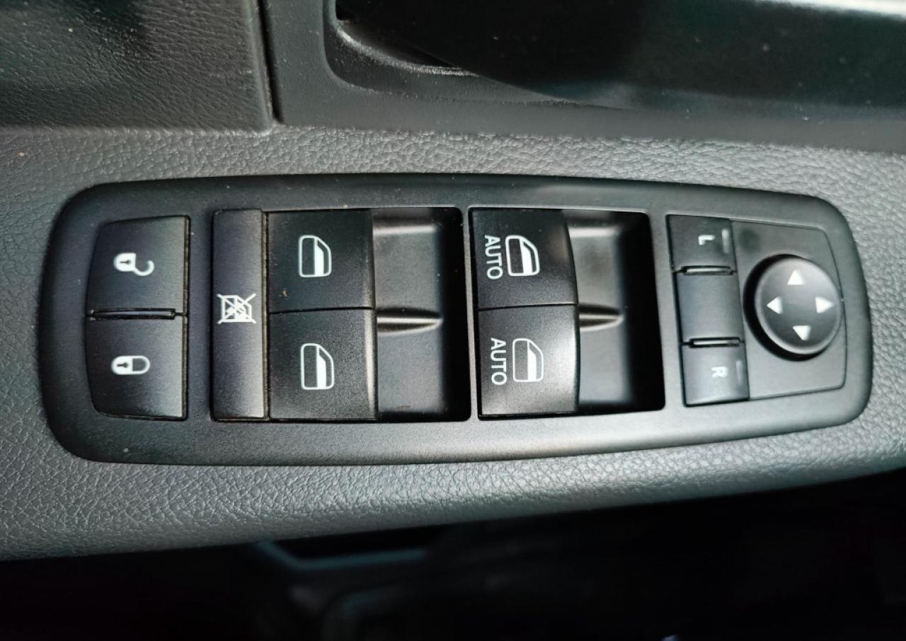 2011 RAM 1500 ST 4dr Quad Cab 4WD SB (4.7L 8cyl 5A) Photo