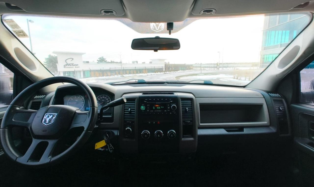 2011 RAM 1500 ST 4dr Quad Cab 4WD SB (4.7L 8cyl 5A) Photo