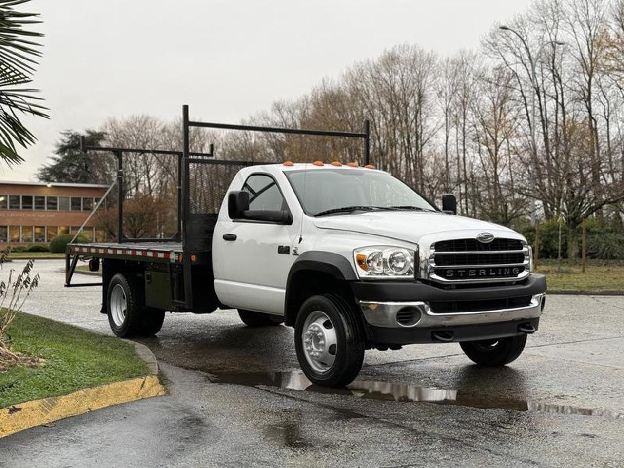 This 2008 Sterling Bullet 4500 12-foot flat deck truck is powered by a 6.7L Cummins 6-cylinder diesel engine with an automatic transmission and rear-wheel drive, and features a white exterior with a grey cloth interior. It includes a 12-by-8-foot deck, fifth-wheel prep, exhaust brake, cruise control, air conditioning and heat, and an AM/FM radio with CD player. The cab is configured for three passengers. This item is currently OFFSITE. You must register an appointment with our office to schedule an offsite viewing. Appointments must be made a minimum of one business day in advance (and as defined by the days that Repo.com is open for business) before your appointment can be scheduled and confirmed. We may, at our own discretion, instead opt to transport smaller items to Repo.coms main yard for viewing purposes.  $45,820.00 plus $375 processing fee, $46,195.00 total payment obligation before taxes.   Listing report, warranty, contract commitment cancellation fee, financing available on approved credit (some limitations and exceptions may apply). All above specifications and information is considered to be accurate but is not guaranteed and no opinion or advice is given as to whether this item should be purchased. We do not allow test drives due to theft, fraud, acts of vandalism and undetectable impaired driving. Instead we provide the following benefits: Complimentary Warranty (with options to extend), Limited Money Back Satisfaction Guarantee on Fully Completed Contracts, Contract Commitment Cancellation, and an Open-Ended Sell-Back Option. Ask seller for details or call 604-522-REPO(7376) to confirm listing availability.