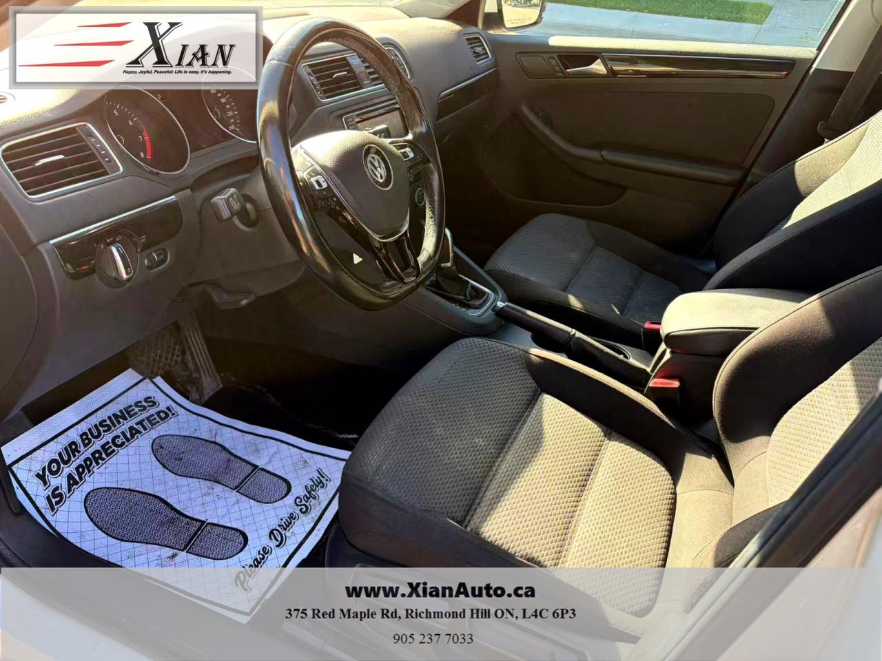 2016 Volkswagen Jetta Sedan 4dr Auto 1.8T Sport PZEV Photo