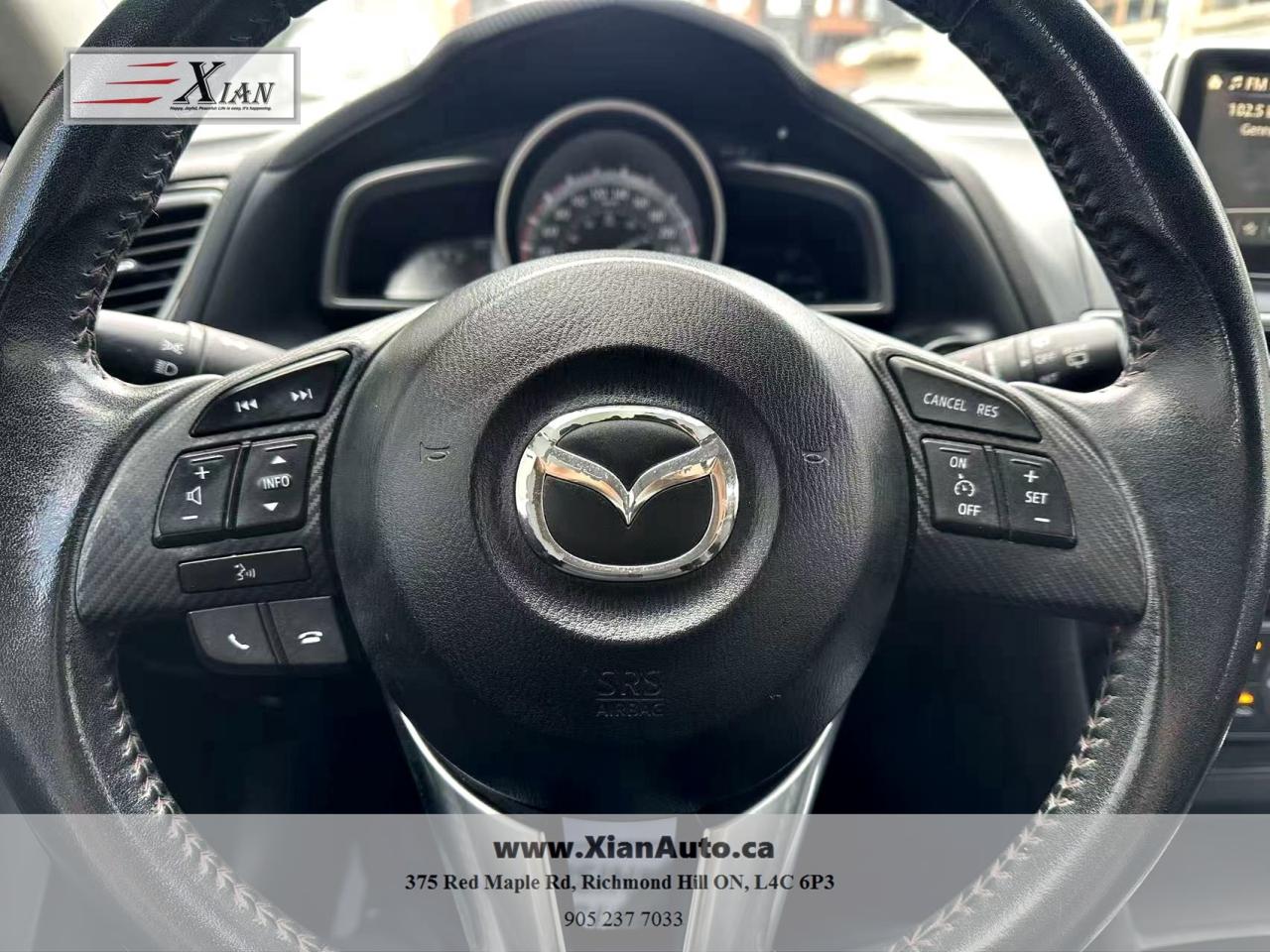 2014 Mazda MAZDA3 4dr HB Sport Auto GS-SKY Photo