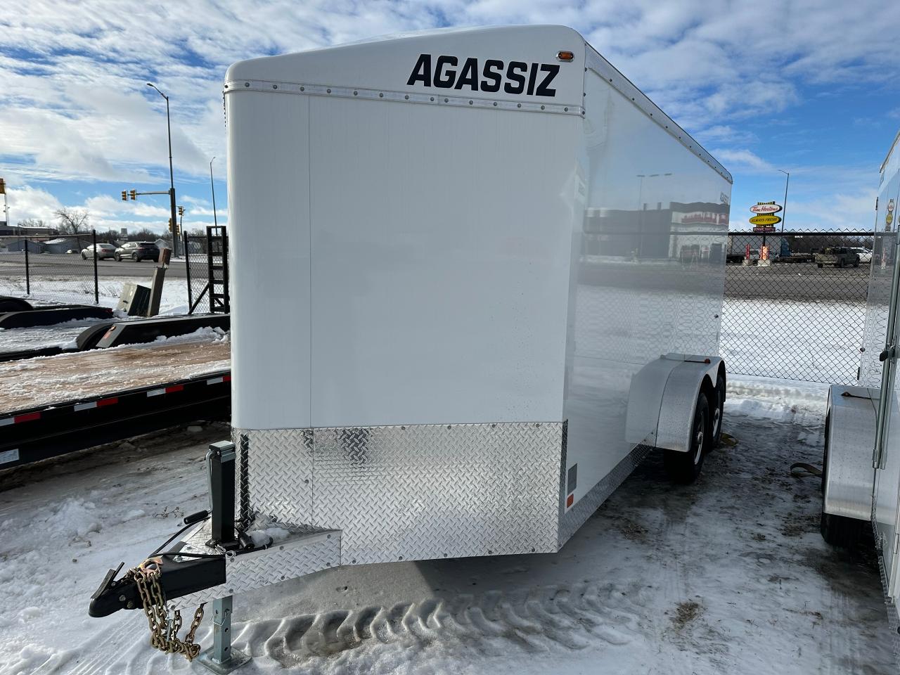 <p><span style=font-family: Segoe UI, sans-serif; background-color: #efefef;>7 x 16 triple wedge, 5200 lb dexter torsion axles, rear ramp door, aluminum cross trax wheel upgrade, 6 extended height, bar lock on side door, laminated sides.</span><span style=mso-spacerun: yes;>&nbsp;&nbsp;</span><span style=font-family: Segoe UI, sans-serif; background-color: #efefef;>Standard features: rock guard, 32&rdquo; side door, 2-12 volt dome lights and switch and a roof vent. &frac34;&rdquo; plywood floor, 3/8&rdquo; plywood on the walls, 6&rdquo; tube frame2 5/16&rdquo; coupler, GVWR 9900 lbs, curb weight 2365 lbs. Stock# HH.</span><span style=mso-spacerun: yes;>&nbsp;&nbsp;</span><span style=font-family: Segoe UI, sans-serif; background-color: #efefef;>For more info call Wilf&rsquo;s Elie Ford toll free 877-360-3673.</span><span style=mso-spacerun: yes;>&nbsp;&nbsp;</span><span style=font-family: Segoe UI, sans-serif; background-color: #efefef;>Dealer # 0521</span></p>