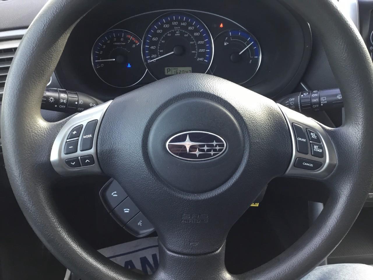 2013 Subaru Forester 2.5X Touring Photo