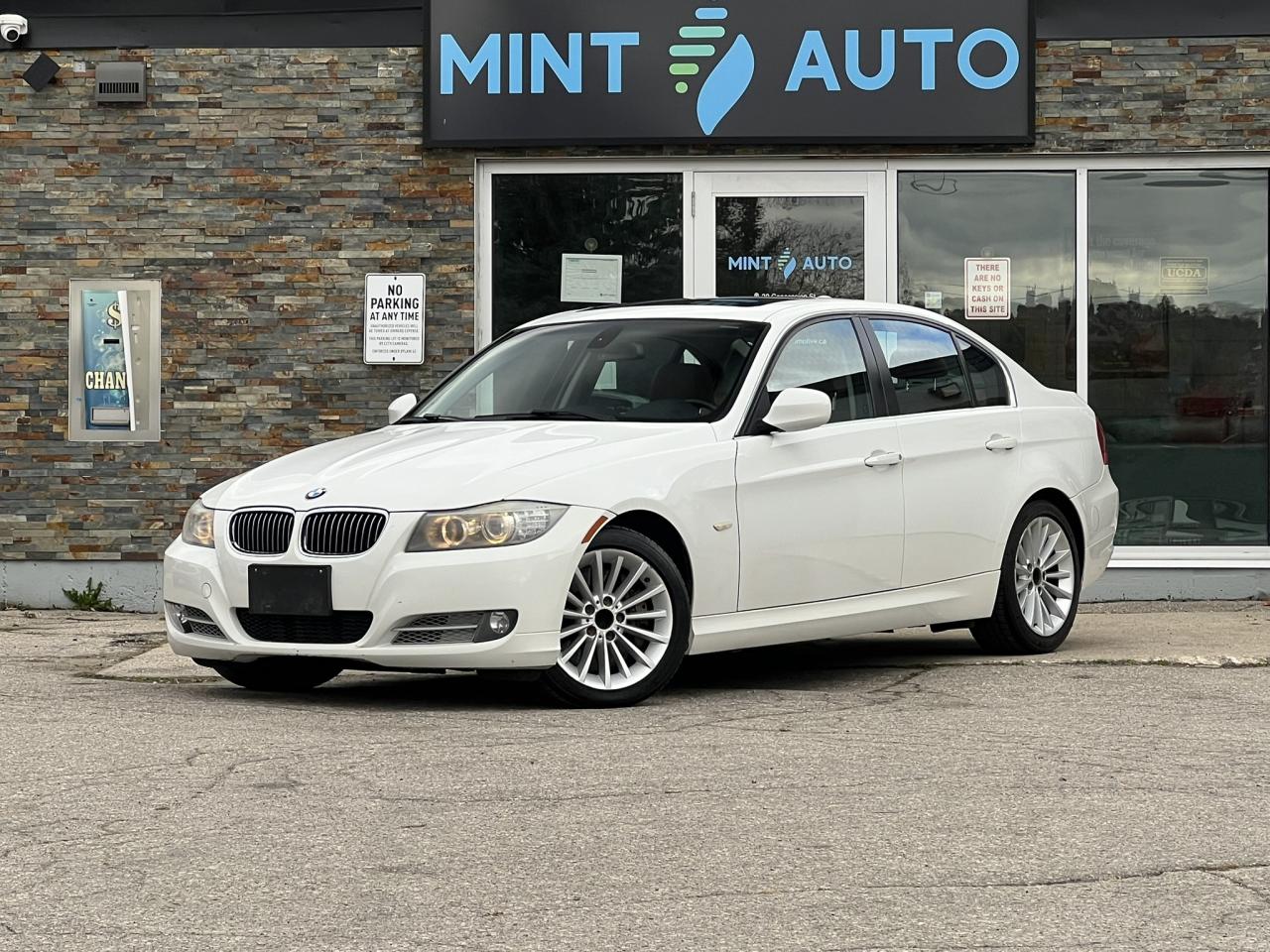2011 BMW 3 Series 335d – Alpine White on Saddle Brown Dakota Leather Photo0