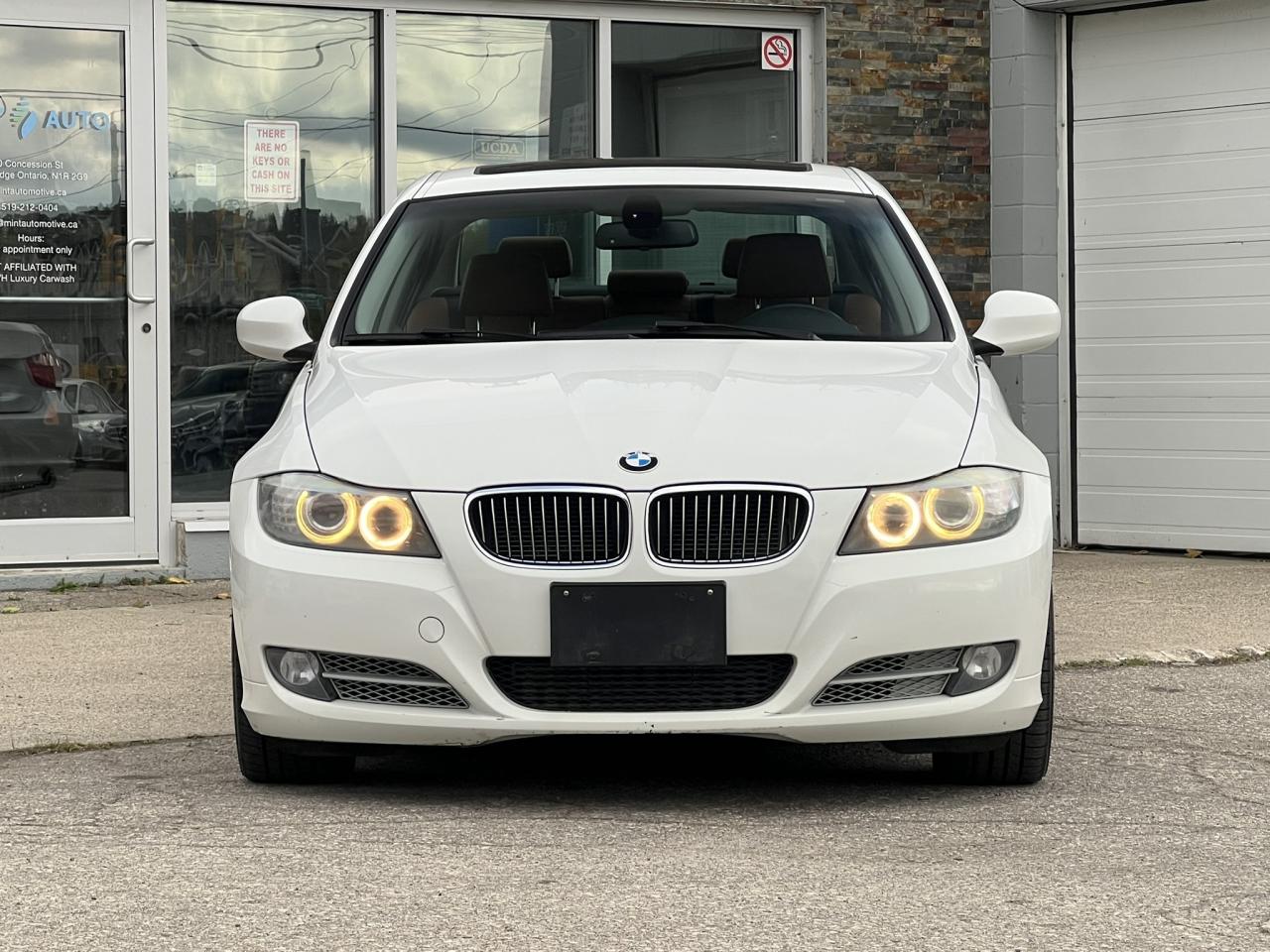 2011 BMW 3 Series 335d – Alpine White on Saddle Brown Dakota Leather Photo