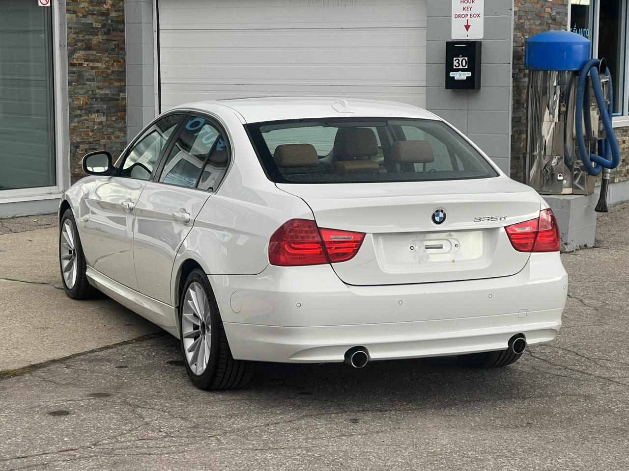 2011 BMW 3 Series 335d – Alpine White on Saddle Brown Dakota Leather Photo