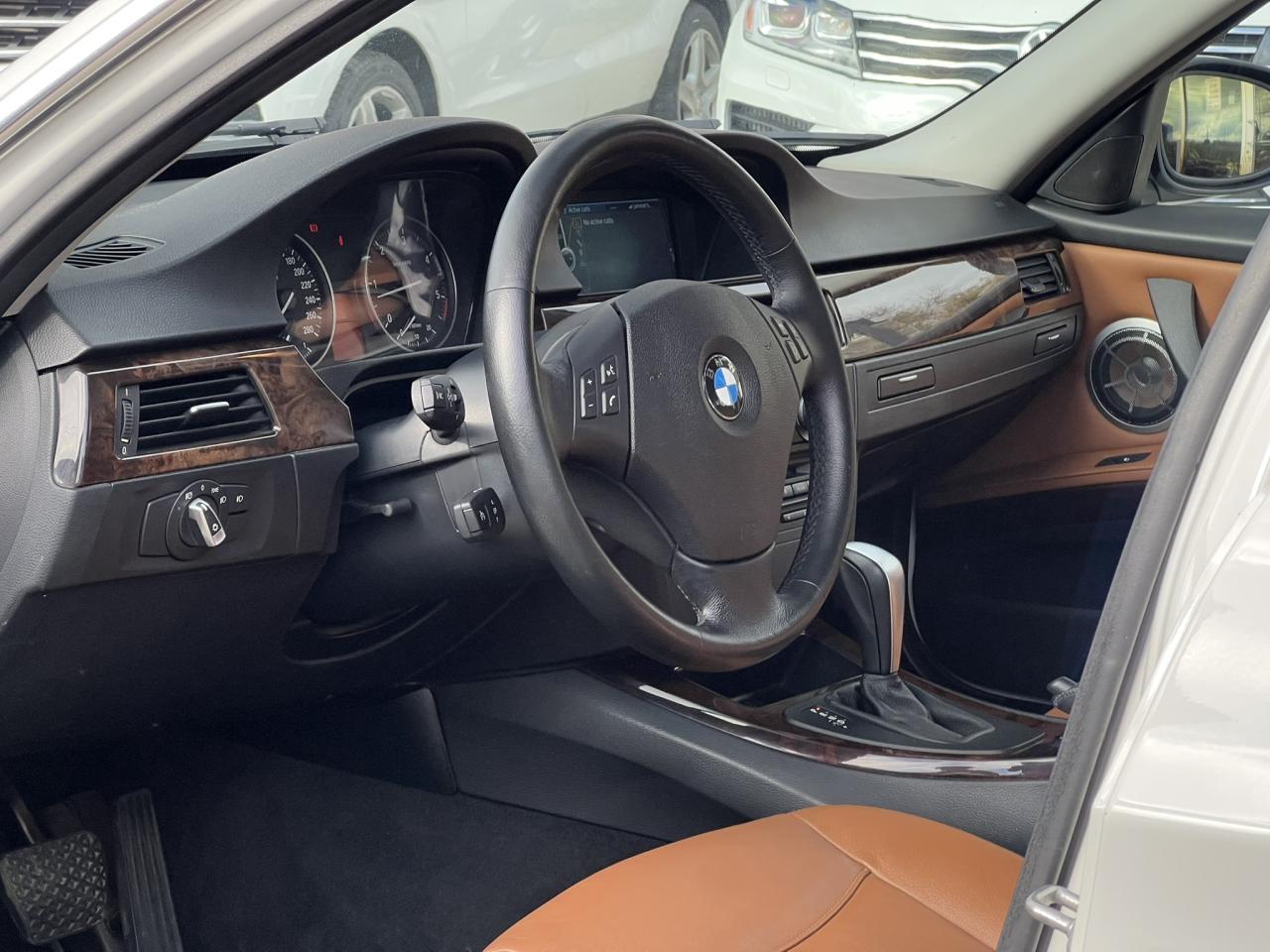 2011 BMW 3 Series 335d – Alpine White on Saddle Brown Dakota Leather Photo