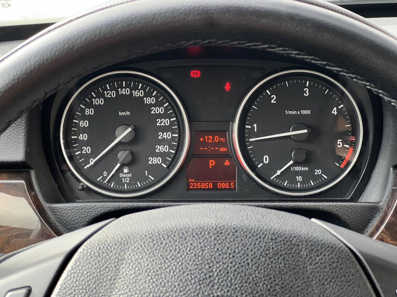 2011 BMW 3 Series 335d – Alpine White on Saddle Brown Dakota Leather Photo