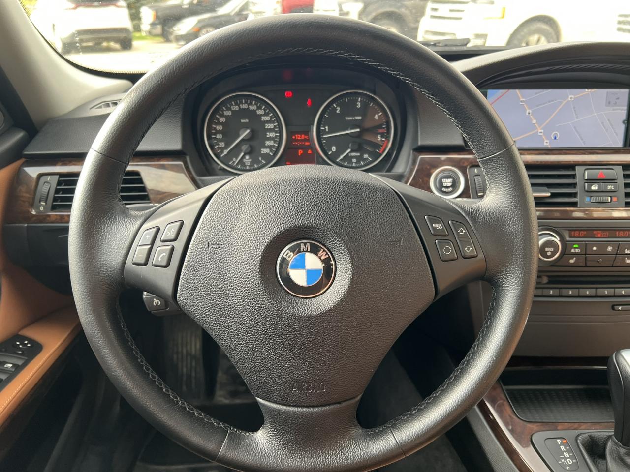 2011 BMW 3 Series 335d – Alpine White on Saddle Brown Dakota Leather Photo