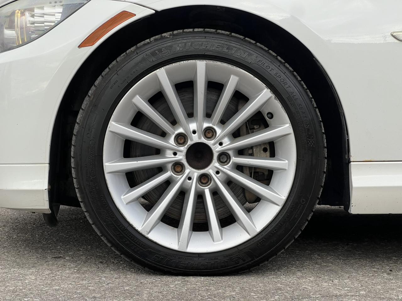 2011 BMW 3 Series 335d – Alpine White on Saddle Brown Dakota Leather Photo