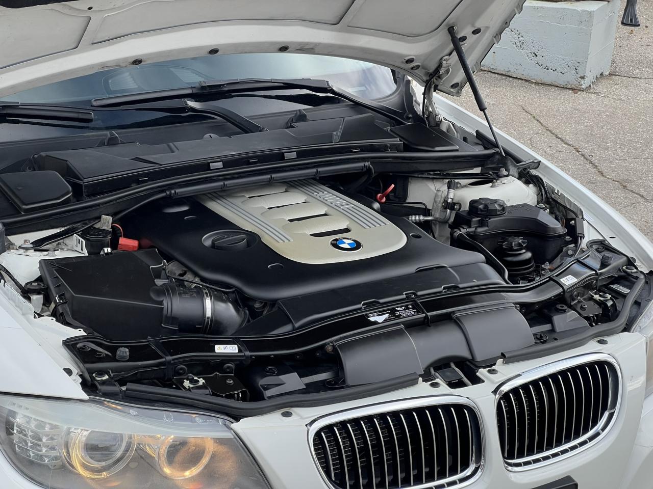 2011 BMW 3 Series 335d – Alpine White on Saddle Brown Dakota Leather Photo