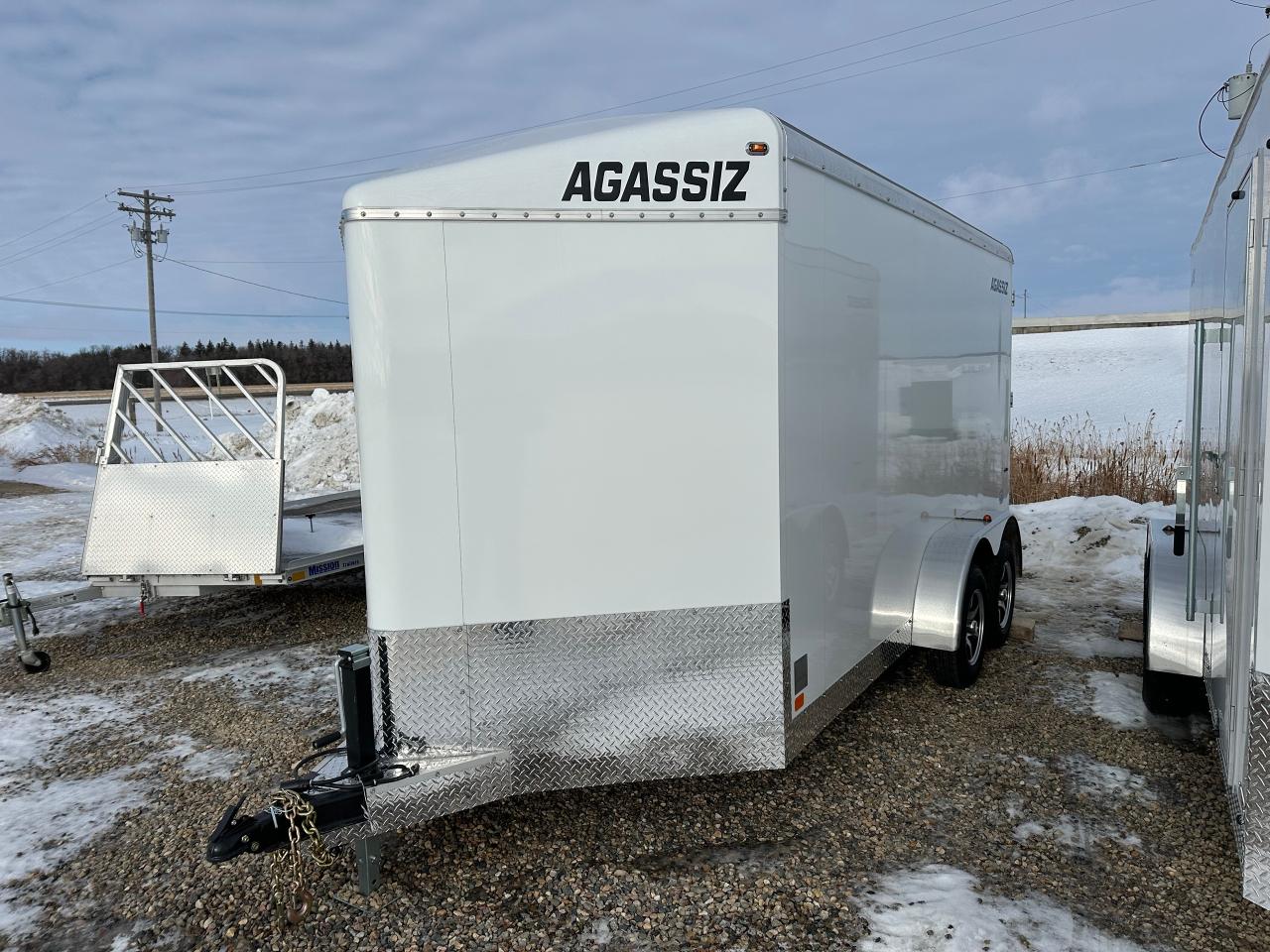 <p><span style=font-family: Segoe UI, sans-serif; background-color: #efefef;>7 x 14 triple wedge, 3500 lb dexter torsion axles, rear barn doors with extra bar lock, aluminum cross trax wheel upgrade, 6 extended height, bar lock on side door, laminated sides.</span><span style=mso-spacerun: yes;>&nbsp;&nbsp;</span><span style=font-family: Segoe UI, sans-serif; background-color: #efefef;>Standard features: rock guard, 32&rdquo; side door, 2-12 volt dome lights and switch and a roof vent. &frac34;&rdquo; plywood floor, 3/8&rdquo; plywood on the walls, 6&rdquo; tube frame2 5/16&rdquo; coupler, GVWR 9900 lbs, curb weight 2024 lbs. Stock# HH5460.</span><span style=mso-spacerun: yes;>&nbsp;&nbsp;</span><span style=font-family: Segoe UI, sans-serif; background-color: #efefef;>For more info call Wilf&rsquo;s Elie Ford toll free 877-360-3673.</span><span style=mso-spacerun: yes;>&nbsp;&nbsp;</span><span style=font-family: Segoe UI, sans-serif; background-color: #efefef;>Dealer # 0521</span></p>