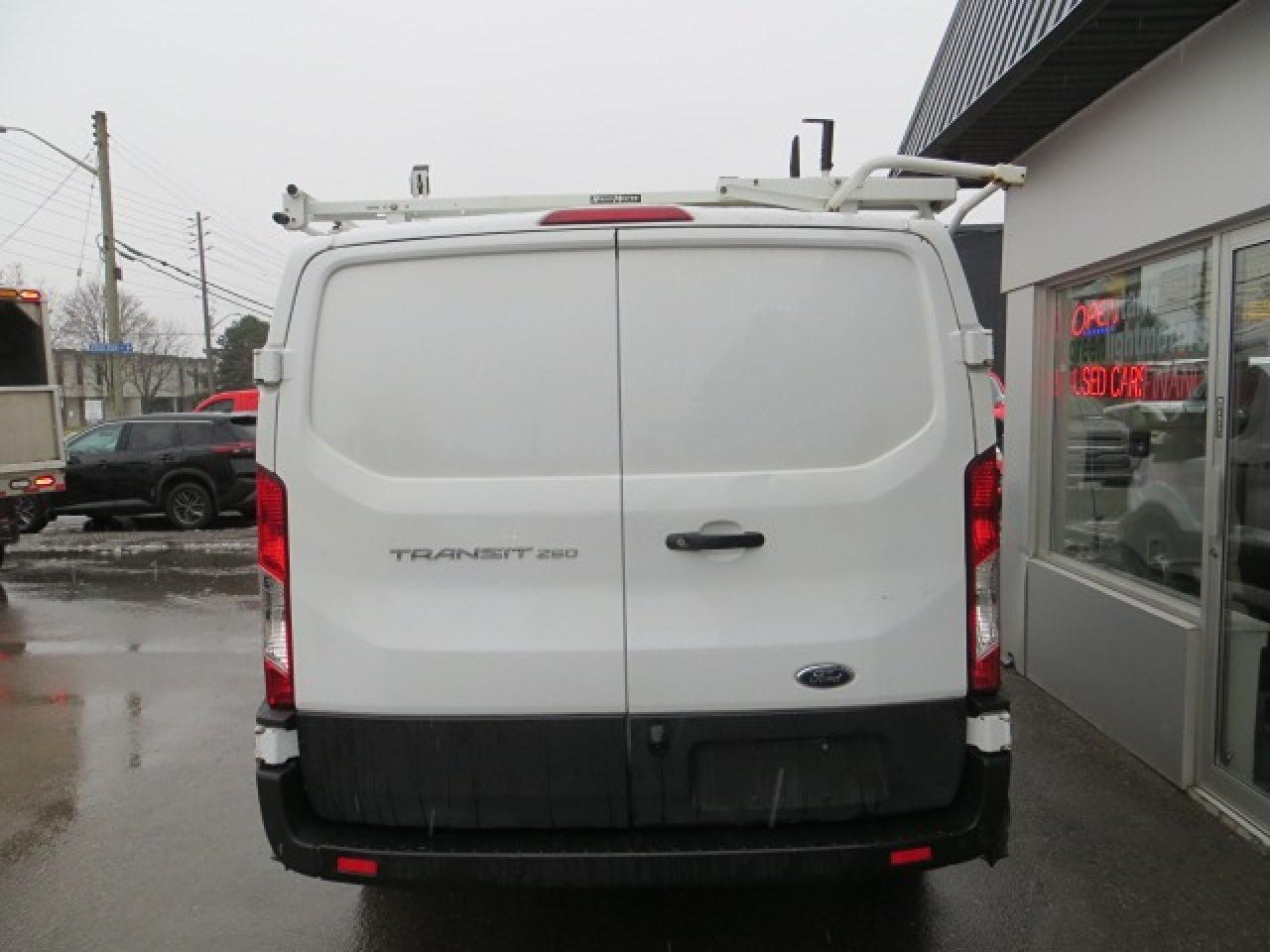2021 Ford Transit Cargo Van CERTIFIED, LADDER RACKS, SHELVES, DIVIDER, BOXES Photo