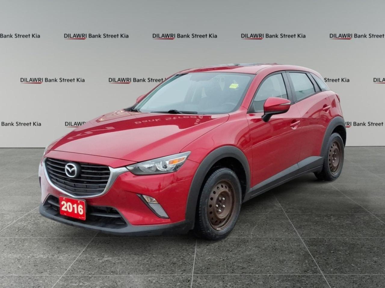 The 2016 Mazda CX-3 GS in stunning Red and equipped with FWD offers an engaging drive and confident handling, making it an ideal choice for those who crave comfort and style. This SUV boasts an athletic exterior design with strikingly styled alloy wheels and a design that catches the eye. Inside, enjoy the refinement and coziness of the cabin, where features like air conditioning and heated seats make every drive pleasurable, while the keyless entry adds a modern convenience. Stay connected and safe with the advanced technology in this CX-3 GS. The Bluetooth connection allows seamless communication and music streaming, and the backup camera aids in easier parking and reverse driving. Additional features like brake assist and cruise control enhance the overall driving experience, contributing to a safer journey for you and your passengers. This vehicle is perfect for urban adventurers and small families looking for a dependable and stylish ride. Contact our dealership now to learn more or to book a test drive of this exceptional Mazda CX-3 GS.