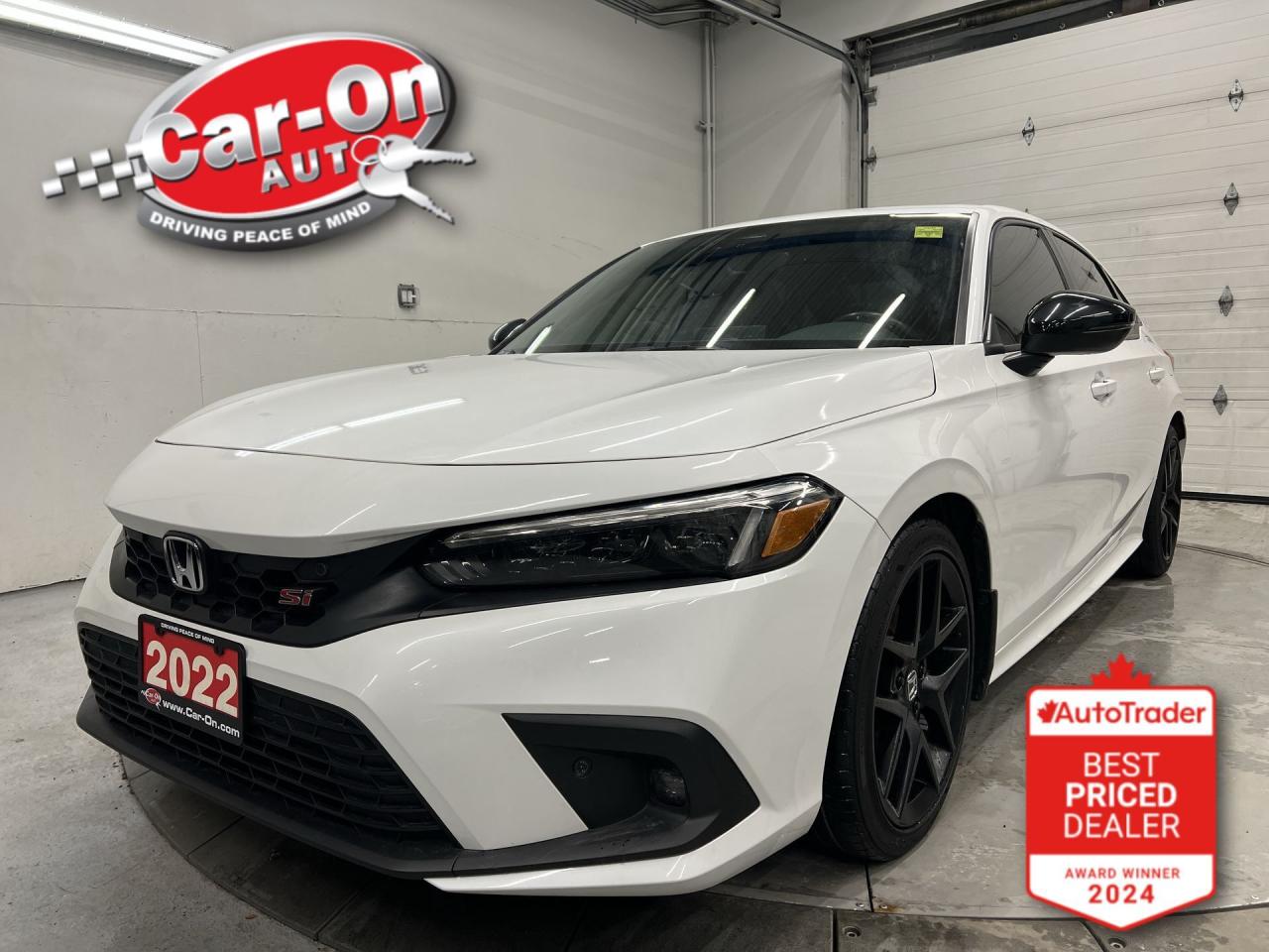 LOADED SI 6-SPEED MANUAL W/ 200HP TURBO ENGINE!! Sunroof, heated sport seats, Apple CarPlay, Android Auto, forward collision warning, adaptive cruise control, road departure mitigation, lane keep assist, blind spot monitor, traffic sign recognition, backup camera, navigation, premium Bose audio system, wireless charger, 18-in alloys, dual-zone climate control, full power group, keyless entry, garage door opener, automatic headlights, auto-dimming rearview mirror, and Sirius XM!!