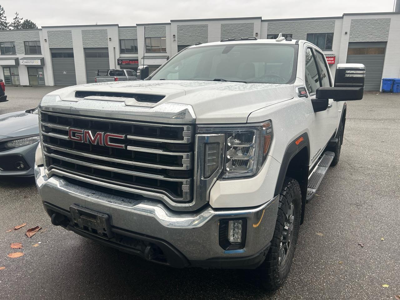<div>One owner local truck, very clean and well equipped</div><p>Looking for a heavy-duty pickup that can handle anything you throw its way? Check out this used 2021 GMC Sierra 3500 SLT, now available at Milani Auto Sales! This rugged 4-wheel drive beast is ready to conquer the toughest Canadian conditions, whether youre hauling equipment to the worksite or heading out on a weekend adventure. With its powerful diesel engine and smooth-shifting automatic transmission, this Sierra is built for both work and play, offering a comfortable ride and impressive towing capabilities. This truck has 149,000 km on the odometer.</p><p>The Sierra 3500 SLT is more than just a workhorse; its packed with features designed for comfort and convenience. Inside, youll find a well-appointed cabin with all the modern amenities you need. The spacious interior provides ample room for passengers and cargo, making it a great choice for families and professionals alike. Plus, the 4-door configuration ensures easy access for everyone.</p><p>Here are a few features that will have you hooked:</p><ul><li><strong>Powerful Diesel Engine:</strong> Experience the raw power and efficiency of a robust diesel engine, perfect for tackling demanding tasks.</li><li><strong>4-Wheel Drive:</strong> Conquer any terrain with confidence, thanks to the capable 4-wheel drive system.</li><li><strong>Automatic Transmission:</strong> Enjoy smooth and effortless gear changes for a comfortable driving experience.</li><li><strong>Spacious Interior:</strong> Relax in a comfortable and well-equipped cabin, perfect for long drives.</li><li><strong>Heavy-Duty Capability:</strong> Get the job done with a truck built to handle the toughest loads and tasks.</li></ul><p><strong><em>Powered by AutoIntelligence™</em></strong> Vehicle information has been generated using artificial intelligence and is provided for informational purposes only. While efforts are made to ensure accuracy, please confirm all details directly with the dealer.</p>