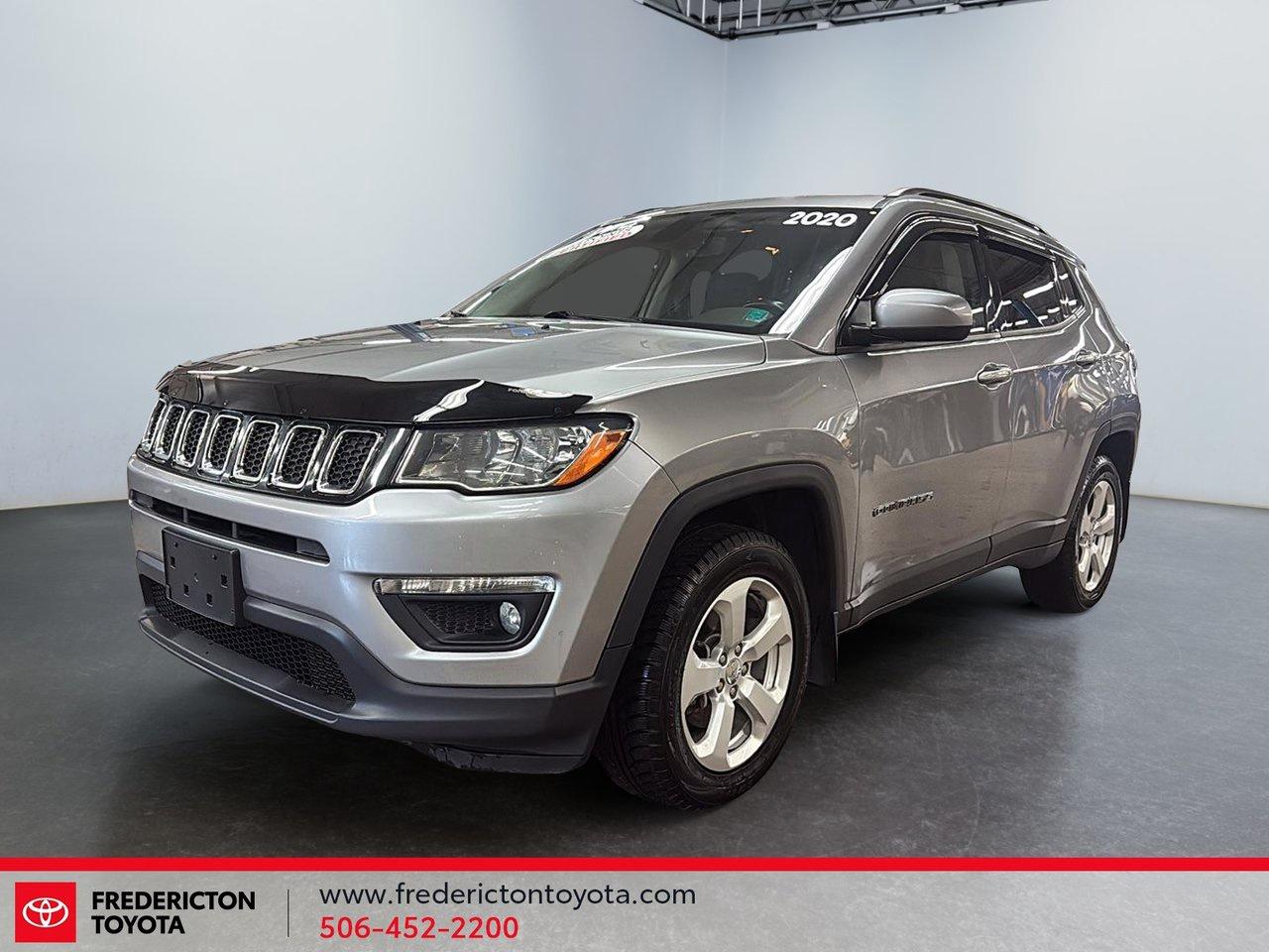 <p data-start=0 data-end=480>This 2020 Jeep Compass North 4X4 is a versatile and confident compact SUV built for Canadian roads. With 4X4 capability, climate control, heated mirrors, a leather-wrapped steering wheel, and a user-friendly infotainment system with Bluetooth and backup camera, it&rsquo;s well suited for both city driving and weekend getaways. Safety features like stability control, brake assist, and multiple airbags add peace of mind, while its comfortable interior makes every drive enjoyable.

<p data-start=482 data-end=681 data-is-last-node= data-is-only-node=>Why choose to buy from Fredericton Toyota? When you buy from us, you&rsquo;re not just a customer. You&rsquo;re part of the family, and we&rsquo;re committed to providing exceptional service every step of the way!