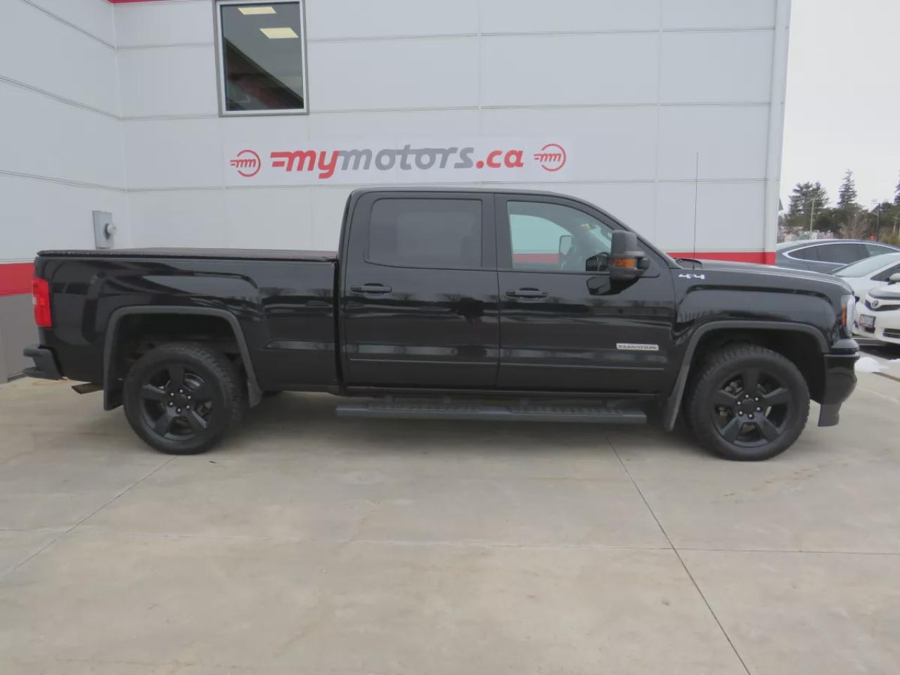 2018 GMC Sierra 1500 SLE (**CLEAN TITLE/NO ACCIDENTS!!**SAFETY/CERTIFIED**4WD**TRAILER HITCH**RUNNING BOARDS**TONNEAU COVER**REMOTE START**POWER SEATS**FOG LIGHTS**DIGITAL TOUCHSCREEN**REVERSE CAMERA**DUAL CLIMATE CONTROL**BLUETOOTH**CRUISE CONTROL**) Photo