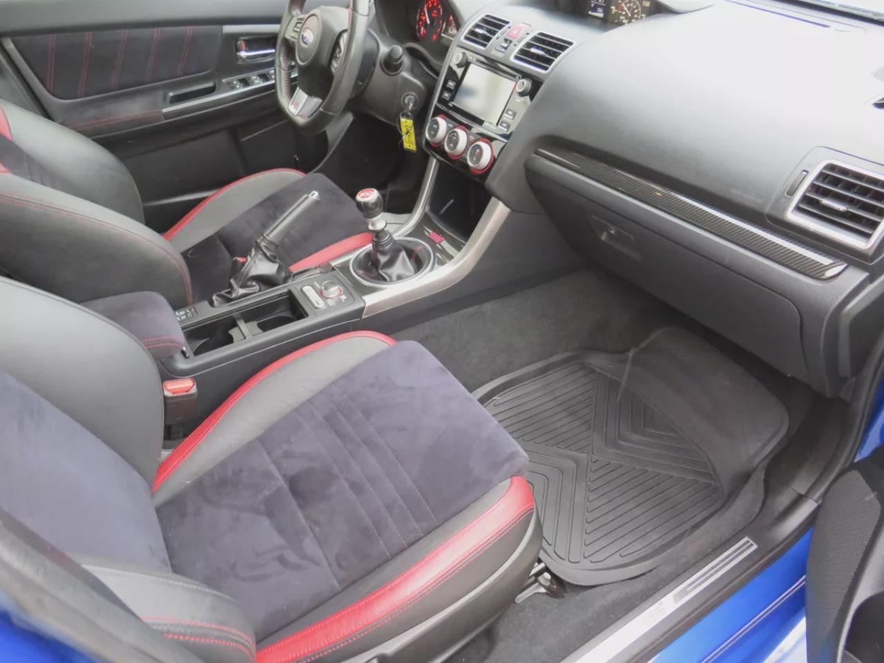 2017 Subaru WRX STI (**VERY LOW KM!!**CLEAN TITLE/NO ACCIDENTS**SAFETY/CERTIFIED!!**AWD**MANUAL TRANSMISSION**ALLOY RIMS**REAR SPOILER**BLIND SPOT DETECTION**REVERSE CAMERA**DIGITAL TOUCHSCREEN**DRIVE MODES**BLUETOOTH**CRUISE CONTROL**) Photo