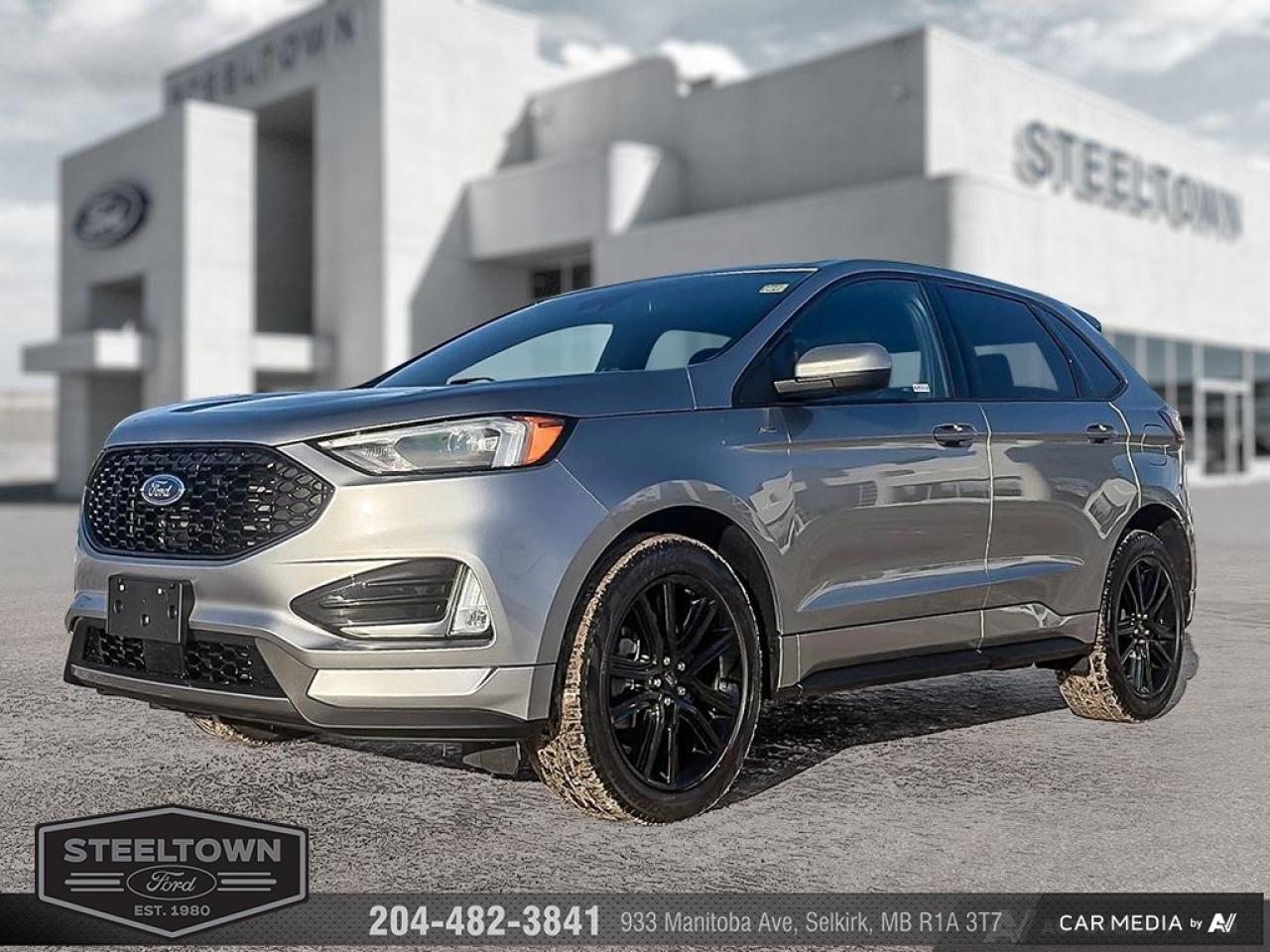 <b>Low Mileage, Heated Seats,  Power Liftgate,  Apple CarPlay,  Android Auto,  Remote Start!</b><br> <br> We value your TIME, we wont waste it or your gas is on us!   We offer extended test drives and if you cant make it out to us we will come straight to you!<br><br><br> <br>Comfortable ride quality, an airy cabin and generous standard tech features make this 2024 Ford Edge a stand-out SUV. This 2024 Ford Edge is for sale today in Selkirk. <br> <br>With meticulous attention to detail and amazing style, the Ford Edge seamlessly integrates power, performance and handling with awesome technology to help you multitask your way through the challenges that life throws your way. Made for an active lifestyle and spontaneous getaways, the Ford Edge is as rough and tumble as you are. Push the boundaries and stay connected to the road with this sweet ride! This low mileage SUV has just 21,803 km. Its Silver in colour and is completely accident free based on the <a href=https://vhr.carfax.ca/?id=8SSRbSsFfUF5DJodu1sIY89IFJA4B2hH target=_blank>CARFAX Report</a>. It has an Automatic transmission and is powered by a 250HP 2.0L 4 Cylinder Engine. <br> <br> Our Edges trim level is SEL. Stepping up to this SEL trim rewards you with plush heated front seats featuring power adjustment and lumbar support, a power liftgate for rear cargo access, a key fob with remote engine start and rear parking sensors, in addition to a 12-inch capacitive infotainment screen bundled with wireless Apple CarPlay and Android Auto, SiriusXM satellite radio, a 6-speaker audio setup, and 4G mobile hotspot internet connectivity. You and yours are assured of optimum road safety, with blind spot detection, rear cross traffic alert, pre-collision assist with automatic emergency braking, lane keeping assist, lane departure warning, forward collision alert, driver monitoring alert, and a rearview camera with an inbuilt washer. Also standard include proximity keyless entry, dual-zone climate control, 60-40 split front folding rear seats, LED headlights with automatic high beams, and even more. This vehicle has been upgraded with the following features: Heated Seats, Power Liftgate, Apple CarPlay, Android Auto, Remote Start, Ford Co-Pilot360, Lane Keep Assist.<br> To view the original window sticker for this vehicle view this <a href=http://www.windowsticker.forddirect.com/windowsticker.pdf?vin=2FMPK4J97RBB02836 target=_blank>http://www.windowsticker.forddirect.com/windowsticker.pdf?vin=2FMPK4J97RBB02836</a>. <br/><br> <br>To apply right now for financing use this link: <a href=http://www.steeltownford.com/?https://CreditOnline.dealertrack.ca/Web/Default.aspx?Token=bf62ebad-31a4-49e3-93be-9b163c26b54c&La target=_blank>http://www.steeltownford.com/?https://CreditOnline.dealertrack.ca/Web/Default.aspx?Token=bf62ebad-31a4-49e3-93be-9b163c26b54c&La</a><br><br> <br/><br>Family owned and operated in Selkirk for 35 Years.  <br>Steeltown Ford is located just 20 minutes North of the Perimeter Hwy, with an onsite banking center that offers free consultations. <br>Ask about our special dealer rates available through all major banks and credit unions.<br><br><br>Steeltown Ford Protect Plus includes:<br>- Life Time Tire Warranty <br>Cars cost less in Selkirk <br><br>Dealer Permit # 1039<br><br><br> Come by and check out our fleet of 100+ used cars and trucks and 140+ new cars and trucks for sale in Selkirk.  o~o