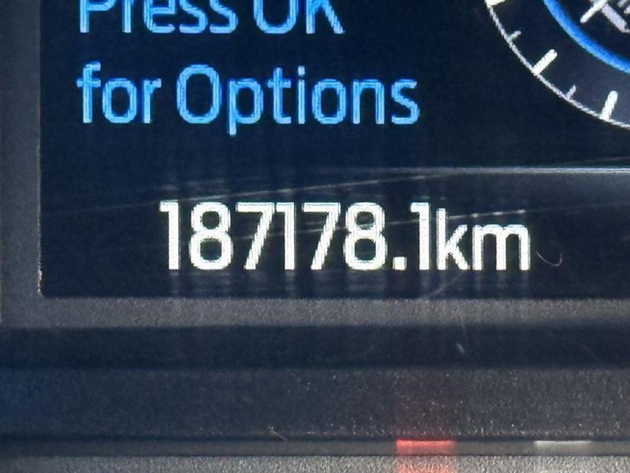 13308437