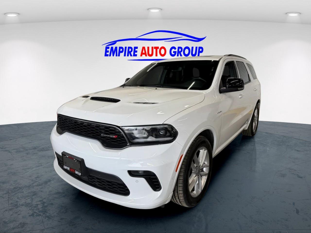 <a href=http://www.theprimeapprovers.com/ target=_blank>Apply for financing</a>

<p>Experience the power and elegance of the 2023 Dodge Durango R/T AWD, a robust SUV that combines performance and style seamlessly. Presented in a sophisticated white finish, this all-wheel-drive vehicle promises exceptional handling for all your adventures. </p><p>The Durango offers a striking exterior complemented by sleek alloy wheels and black roof rails, making it perfect for both city drives and countryside escapes. Step inside, and youll find a luxurious interior featuring premium leather seats and a leather steering wheel that enhance its sophisticated appeal. The spacious cabin is equipped with modern conveniences such as power seats, heated and cooled front seats, and a sunroof/moonroof for added comfort and style.</p><p>This SUV is packed with cutting-edge technology and safety features designed to keep you connected and secure on the road. Enjoy seamless connectivity with Bluetooth, smart device integration, and a wi-fi hotspot, while the navigation system ensures you reach your destinations with ease. Advanced safety features include a backup camera, lane assist, parking sensors, adaptive cruise control, and brake assist, all working together to provide peace of mind on every journey.</p><p>Ideal for families and adventure enthusiasts alike, the 2023 Dodge Durango R/T AWD is the perfect companion for those who crave both excitement and practicality. Dont miss out on the opportunity to experience this impressive vehicle for yourself. Contact us today to arrange a test drive and learn more about this dynamic SUV.</p><p>All our certified cars comes with 250 point inspection. 0 Down Payment Options Available. Whether its excellent, good, bad, no credit, collections, a discharged bankruptcy or proposal, even if your still in bankruptcy or proposal, have fines or parking tickets including 407 ETR fines, been divorced, young and no one will give you a shot, new to the country, have a fixed income or are currently self-employed, if you have the income we have the lenders that can get it done, you name it, there are lenders out there that will finance you!</p>                         <p><b>ALL CREDIT SITUATIONS ACCEPTED! Dont hesitate&nbsp;<a class=redborder href=apply.php target=_blank rel=noopener>APPLY NOW!</a></b></p>                         <p>*All payments shown are based on a 4.95%. Rate of borrowing a vehicle over qualified term based on the lender. Example: The cost of borrowing on a vehicle, at the purchase price of $10,000, at 4.95% rate of borrowing over 60 month term would be $43.45+HST weekly. Rates are subject to change without notice. Payments are available on approved credit. <b>Best Interest Rate</b>&nbsp;for your car loan Guaranteed!&nbsp;<i>Vehicle being presented might not be financeable; payments are available on approved credit.</i></p>                         <p><b>* All prices exclude HST and Licensing.&nbsp;</b><b>*At times, a down payment may be required for financing however we will do our best to achieve a $0 down payment.</b></p>                         <p><b>* Guaranteed Savings ask one of our representatives for details all in pricing with only HST extra and discounts offered on our vehicles and warranties. *Financing does NOT apply for As-Is vehicles.</b></p>                         <p><b>* As per OMVIC regulations&comma; this vehicle is not road worthy,  not safety certified and not licensed. Certification is available for $799. All our vehicles are in excellent condition and have been fully inspected by an in-house licensed mechanic. Each Empire Auto Group client is a satisfied guest, GUARANTEED!</b></p>                         <p>* Empire Auto Group shall not be held liable for any errors or omissions pertaining to information provided (whether orally, in writing, or in digital image form) on this website, included but not limited to: year, make, model, vehicle options (both hardware and software), vehicle condition, vehicle trim, accessories, mileage. Client is solely responsible for performing appropriate due diligence as it pertains to any and all information regarding the type, condition, options, vehicle trim, status, and history of vehicle before completing a transaction. The advertised price is a finance only price, if you wish to purchase the vehicle for cash additional $2,000 surcharge will apply. Applicable prices and special offers are subject to change with or without notice and shall be at the full discretion of Empire Auto Group.</p>                         <p>* Vehicle sold as seen as equipped. Cosmetic repairs & non safety items at customers cost if requested.</p>                         <p>This vehicle could be at any of our 3 locations - Empire Auto East (2293 Dundas St, London, ON) or Empire Auto West (282 Springbank Dr, London, ON) or Southdale Motors (284 Springbank Dr, London, ON). Please call us for more information.</p><br/><br/>Looking to Purchase or Finance a Dodge Durango or just a Dodge Suv? We carry 100s of handpicked vehicles, with multiple Dodge Suvs in stock! Visit us online at <a href=https://empireautogroup.ca/?source_id=6>www.EMPIREAUTOGROUP.CA</a> to view our full line-up of Dodge Durangos or  similar Suvs. New Vehicles Arriving Daily!<br/>  	<br/>FINANCING AVAILABLE FOR THIS LIKE NEW DODGE DURANGO!<br/> 	REGARDLESS OF YOUR CURRENT CREDIT SITUATION! APPLY WITH CONFIDENCE!<br/>  	SAME DAY APPROVALS! <a href=https://empireautogroup.ca/?source_id=6>www.EMPIREAUTOGROUP.CA</a> or CALL/TEXT 519.659.0888.<br/><br/>	   	THIS, LIKE NEW DODGE DURANGO INCLUDES:<br/><br/>  	* Wide range of options that you will enjoy.<br/> 	* Comfortable interior seating<br/> 	* Safety Options to protect your loved ones<br/> 	* Fully Certified<br/> 	* Pre-Delivery Inspection<br/> 	* Door Step Delivery All Over Ontario<br/> 	* Empire Auto Group  Seal of Approval, for this handpicked Dodge Durango<br/> 	* Finished in White, makes this Dodge look sharp<br/><br/>  	SEE MORE AT : <a href=https://empireautogroup.ca/?source_id=6>www.EMPIREAUTOGROUP.CA</a>