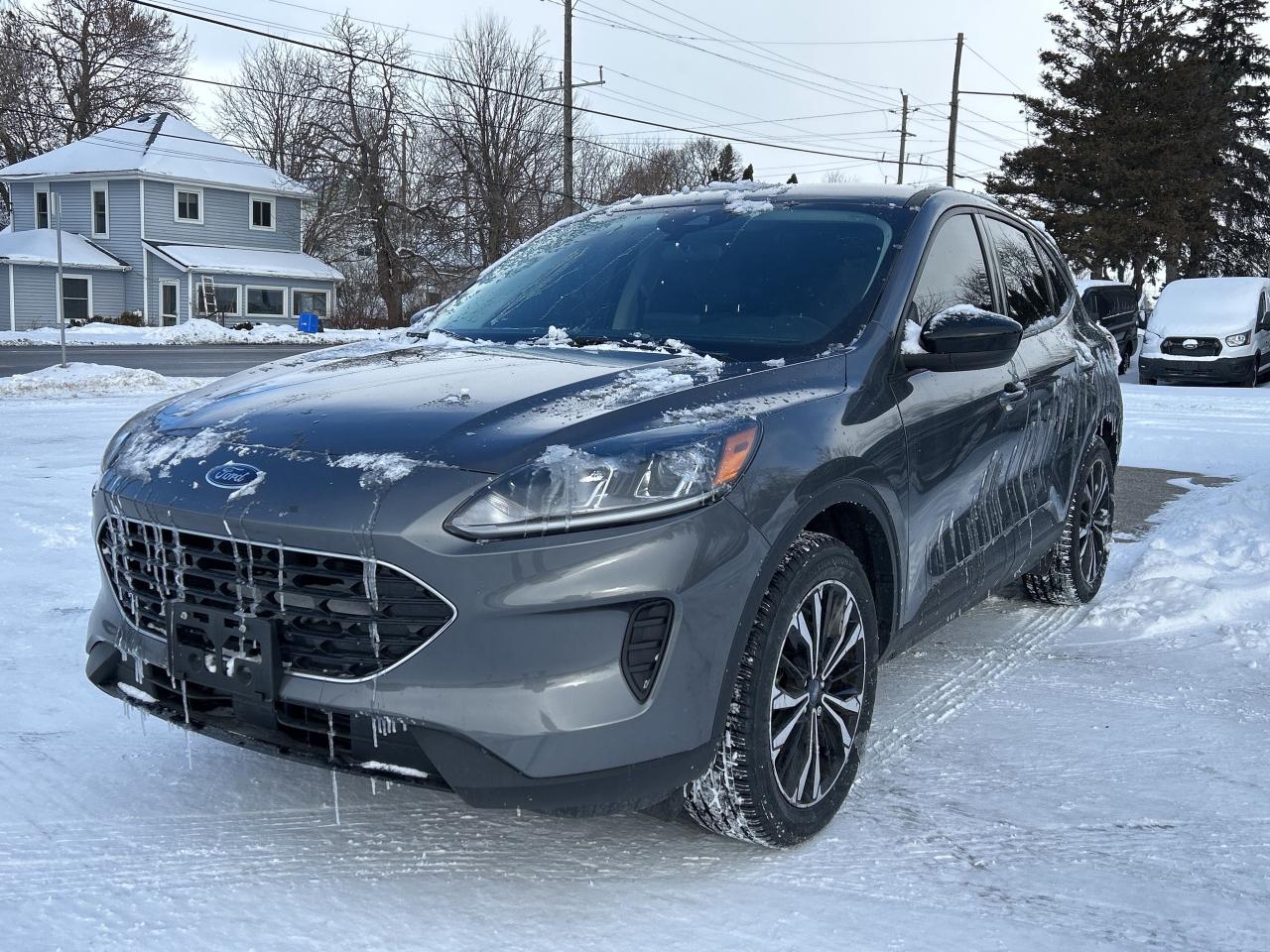 <p>Looking for a versatile and reliable SUV that can handle Canadian winters? Check out this pre-owned 2022 Ford Escape SE AWD, available now at Winegard Ford! This sleek SUV, finished in a sophisticated Carbonized Gray Metallic, offers a stylish and practical solution for your daily driving needs. With its automatic transmission and all-wheel drive, youll experience a smooth and confident ride, whether youre navigating city streets or exploring the open road. This Escape has a comfortable interior and plenty of cargo space, making it perfect for families, adventurers, and anyone in between.</p><p>&nbsp;</p><p>This Escape has only 60,949 KM on the odometer, meaning it has plenty of life left. The 2022 Ford Escape SE AWD is packed with features designed to enhance your driving experience.</p><p>&nbsp;</p><p>Here are five features that will make you want to drive this Escape home today:</p><p><br><br></p><ul><li><strong>All-Wheel Drive:</strong> Conquer any weather condition with confidence.</li></ul><p>&nbsp;</p><ul><li><strong>Fuel Efficiency:</strong> Save money at the pump with its impressive fuel economy.</li></ul><p>&nbsp;</p><ul><li><strong>Spacious Interior:</strong> Enjoy ample room for passengers and cargo.</li></ul><p>&nbsp;</p><ul><li><strong>Modern Technology:</strong> Stay connected and entertained with the latest tech features.</li></ul><p>&nbsp;</p><ul><li><strong>Stylish Design:</strong> Turn heads with its sleek and modern exterior.</li></ul><p><br><br></p><p><strong><em>Powered by AutoIntelligence&trade;</em></strong><br>Vehicle information has been generated using artificial intelligence and is provided for informational purposes only. While efforts are made to ensure accuracy, please confirm all details directly with the dealer.</p><p>&nbsp;</p>