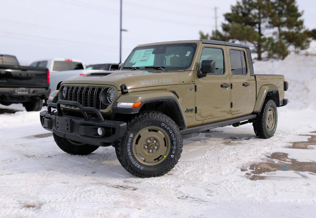 Set up to handle dirt, gravel, and changing conditions, our New 2026 Jeep Gladiator Willys 4X4 in 41 provides assured traction and steady control when the pavement ends. Powered by a 3.6 Litre Pentastar V6 supplying 285hp to an 8 Speed Automatic transmission for muscular performance. A limited-slip rear differential, Dana axles, and an off-road suspension combine for trail-ready handling in this Four Wheel Drive truck, which scores approximately 10.7L/100km on the highway with a genuine Jeep exterior. Get a good look at our Gladiators LED lighting, exclusive Willys decals, black alloy wheels, padded sportbar, cab rock rails, removable soft top, and a Class II bumper hitch so youre ready to tow and go.  Supportive heated front seats are at your service for rewarding comfort in our Willys cabin. They complement a premium-wrapped heated steering wheel, automatic climate control, keyless entry, pushbutton ignition, and modern technology for making the most of each trip. Highlights include a 12.3-inch touchscreen, a 7-inch driver display, an eight-speaker sound system, voice control, and smart connectivity with Apple CarPlay&reg;, Android Auto&reg;, Bluetooth&reg;, and WiFi/Alexa compatibility.  Remain safe as you roam free, enjoying peace of mind from a rearview camera with trailer-hitch zoom, automatic braking, forward collision warning, hill start assistance, trailer sway control, tire pressure monitoring, and more. A truck only Jeep could build, our Gladiator Willys needs a driver like you! Save this Page and Call for Availability. We Know You Will Enjoy Your Test Drive Towards Ownership!