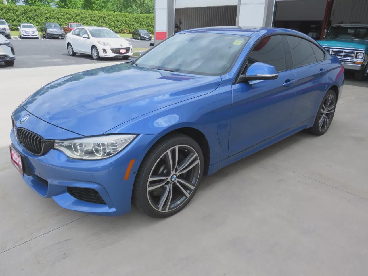 2016 BMW 4 Series 435I Xdrive  | Low Km | Clean Title | No Accidents | Safety Certified | AWD | Alloy Rims | Navigation | Sunroof | Heated Seats | Dual Exhaust | Leather | Power Seats | Reverse Camera | Rear Privacy Cover | Rear Weather Tech Mat | Rubber Mats | Bluetooth Photo