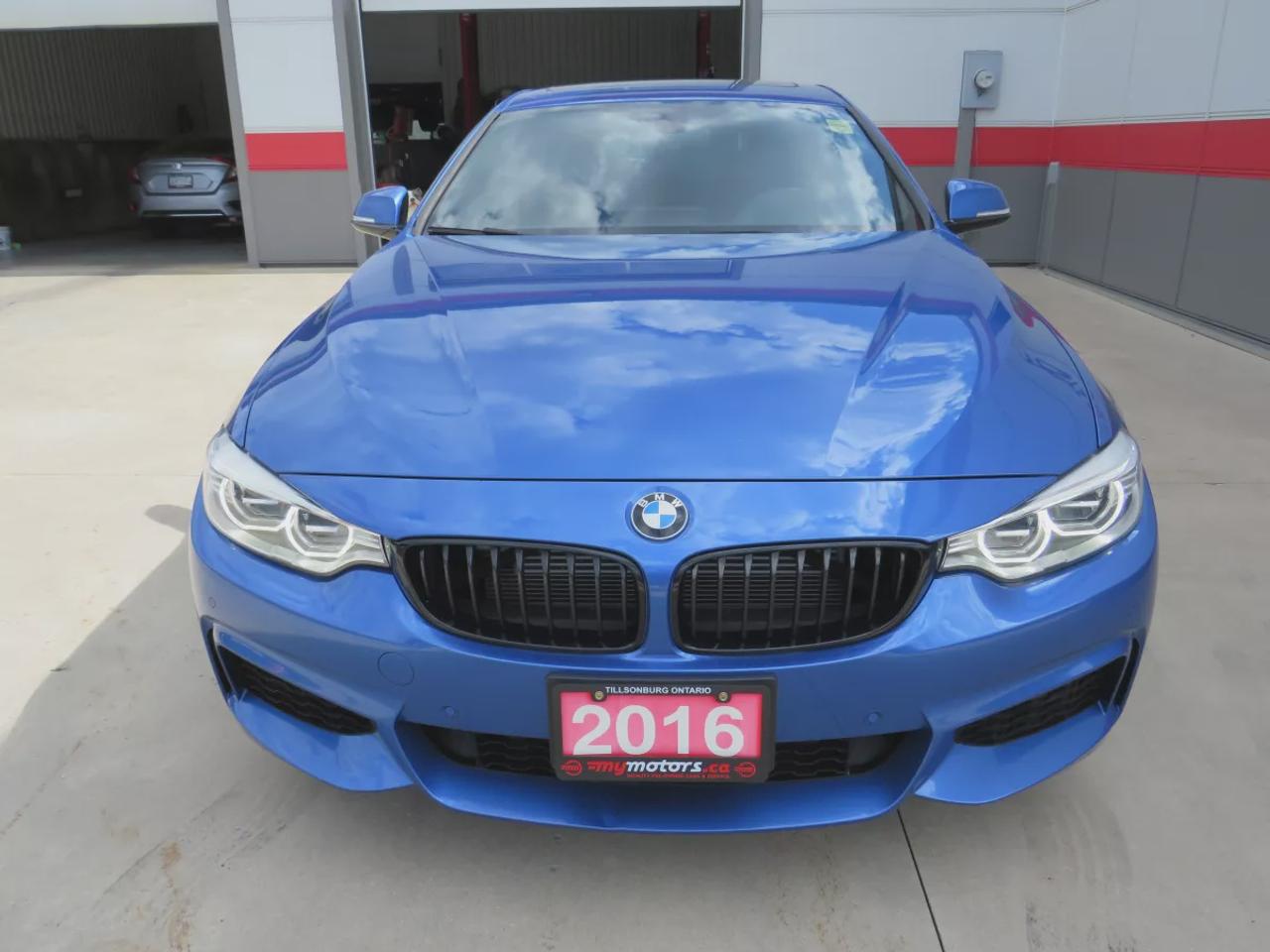 2016 BMW 4 Series 435I Xdrive  | Low Km | Clean Title | No Accidents | Safety Certified | AWD | Alloy Rims | Navigation | Sunroof | Heated Seats | Dual Exhaust | Leather | Power Seats | Reverse Camera | Rear Privacy Cover | Rear Weather Tech Mat | Rubber Mats | Bluetooth Photo
