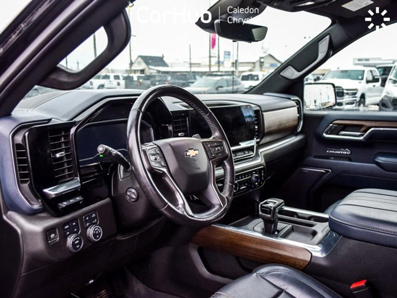 2023 Chevrolet Silverado 1500 High Country 4WD Crew Cab 147" 5.3L Leather  5 passengers with captain chair Photo