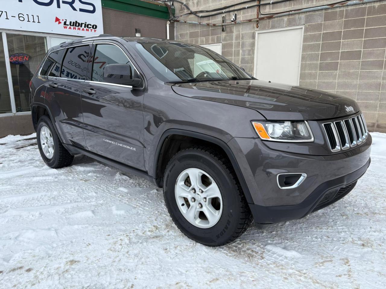 Used 2015 Jeep Grand Cherokee 4WD 4Dr Laredo for sale in Calgary, AB