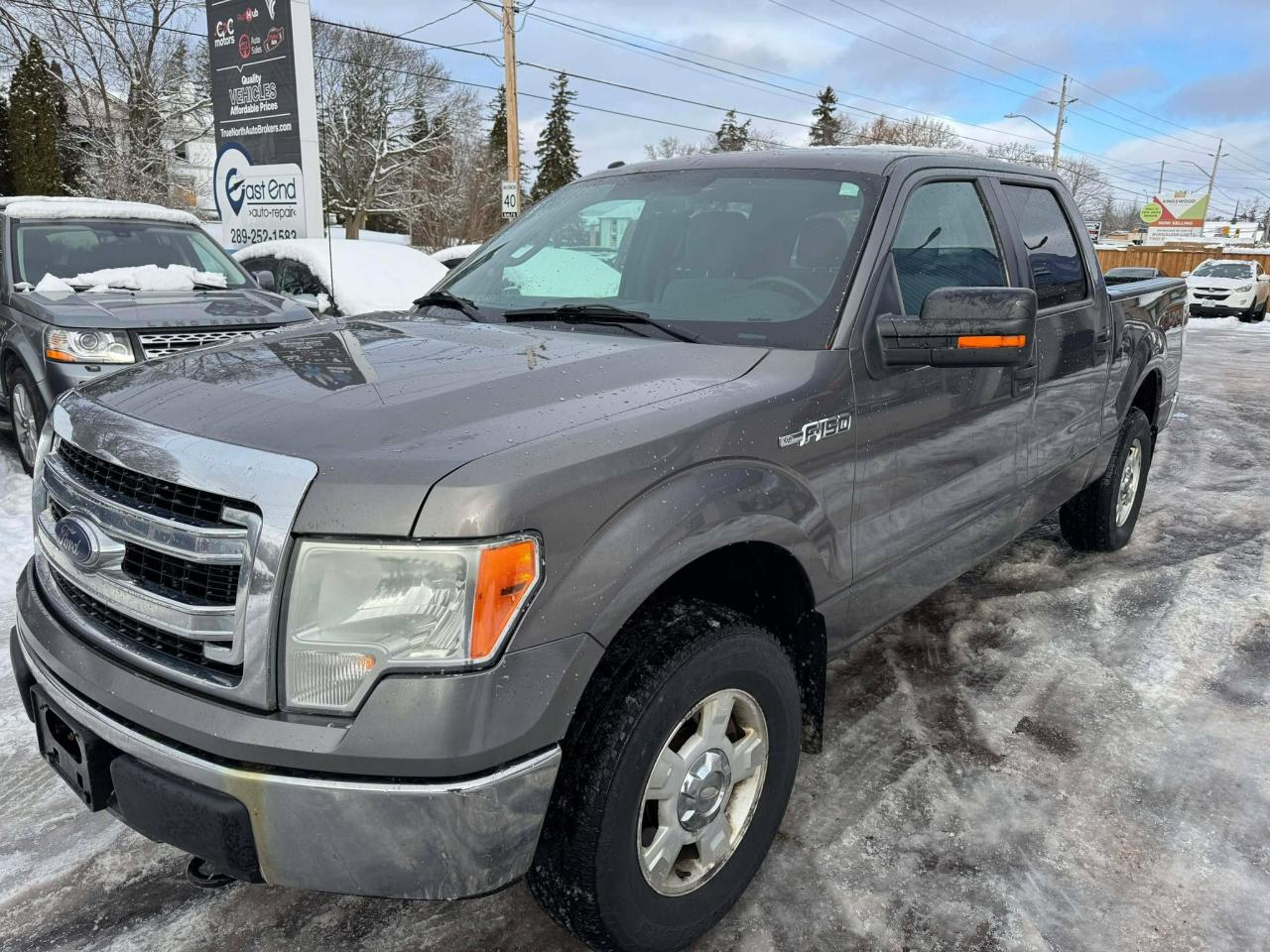 2013 Ford F-150 4WD SUPERCREW 145" XLT Photo2