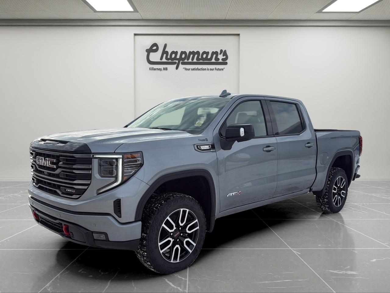 <p>The <strong>2026 GMC Sierra 1500 AT4 Crew Cab 4WD</strong> is engineered for drivers who want true off-road capability without giving up luxury or technology. Finished in stunning <strong>Sterling Metallic</strong> with a bold <strong>Jet Black / Kalahari interior</strong>, this AT4 delivers rugged presence with upscale refinement.</p><p>Power comes from the fuel-efficient yet torque-rich <strong>Duramax 3.0L Turbo-Diesel</strong>, paired with a smooth <strong>10-speed automatic transmission</strong>. This combination delivers outstanding towing confidence, long-range highway efficiency, and effortless everyday driving.</p><p>With a <strong>factory 2" AT4 suspension lift</strong>, skid plates, locking rear differential, and advanced 4WD system, this Sierra is built to handle snow, trails, job sites, and towing with equal confidence.</p><h3><strong>AT4 Performance & Capability</strong></h3><ul><li><p><strong>Duramax 3.0L Turbo-Diesel Engine</strong></p></li><li><p><strong>10-Speed Automatic Transmission</strong></p></li><li><p><strong>2-Speed AutoTrac Transfer Case</strong></p></li><li><p><strong>Automatic Locking Rear Differential</strong></p></li><li><p><strong>AT4 Off-Road Suspension with 2" Factory Lift</strong></p></li><li><p><strong>Monotube Shocks & Skid Plates</strong></p></li><li><p><strong>Hill Descent Control</strong></p></li><li><p><strong>Trailer Brake Controller</strong></p></li><li><p><strong>120V Power Outlets (Cab & Bed)</strong></p></li><li><p><strong>Goodyear Wrangler Territory MT Off-Road Tires</strong></p></li></ul><h3><strong>AT4 Premium Interior</strong></h3><p>Designed for comfort on long drives and rough terrain:</p><ul><li><p><strong>Heated & Ventilated Front Bucket Seats</strong></p></li><li><p><strong>Heated Second-Row Outboard Seats</strong></p></li><li><p><strong>10-Way Power Front Seats with Memory</strong></p></li><li><p><strong>Power Tilt & Telescoping Steering Column</strong></p></li><li><p><strong>Heated Leather-Wrapped Steering Wheel</strong></p></li><li><p><strong>Wireless Phone Charging</strong></p></li><li><p><strong>Premium Floor Liners</strong></p></li><li><p><strong>Adaptive Cruise Control</strong></p></li><li><p><strong>Rear Sliding Power Window</strong></p></li></ul><h3><strong>Technology & Connectivity</strong></h3><p>A fully digital, driver-focused cockpit:</p><ul><li><p><strong>13.4" GMC Premium Infotainment Touchscreen with Google Built-In</strong></p></li><li><p><strong>Wireless Apple CarPlay & Android Auto</strong></p></li><li><p><strong>12.3" Digital Driver Information Centre</strong></p></li><li><p><strong>Bose Premium Sound System</strong></p></li><li><p><strong>In-Vehicle Trailering App</strong></p></li><li><p><strong>Keyless Open & Remote Start</strong></p></li><li><p><strong>OnStar Basics (Up to 8 Years)</strong></p></li><li><p><strong>3-Year SiriusXM Subscription</strong></p></li></ul><h3><strong>Technology Package</strong></h3><p>Adds next-level visibility and control:</p><ul><li><p><strong>15" Multicolour Head-Up Display</strong></p></li><li><p><strong>Rear Camera Mirror</strong></p></li><li><p><strong>Bed View Camera</strong></p></li></ul><h3><strong>Safety & Driver Assistance</strong></h3><p>Equipped with GMC Pro Safety Plus:</p><ul><li><p><strong>Automatic Emergency Braking</strong></p></li><li><p><strong>Forward Collision Alert</strong></p></li><li><p><strong>Front Pedestrian Braking</strong></p></li><li><p><strong>Lane Keep Assist & Lane Departure Warning</strong></p></li><li><p><strong>Trailer Side Blind Zone Alert</strong></p></li><li><p><strong>Rear Cross Traffic Braking</strong></p></li><li><p><strong>Rear Pedestrian Alert</strong></p></li><li><p><strong>HD Surround Vision</strong></p></li><li><p><strong>Safety Alert Seat</strong></p></li><li><p><strong>Front & Rear Park Assist</strong></p></li></ul><h3><strong>Exterior Highlights</strong></h3><ul><li><p><strong>20" Machined Aluminum Wheels with Carbon Grey Accents</strong></p></li><li><p><strong>GMC MultiPro Tailgate</strong></p></li><li><p><strong>Spray-On Bedliner</strong></p></li><li><p><strong>LED Headlamps, Fog Lamps & Tail Lamps</strong></p></li><li><p><strong>LED Cargo Area Lighting</strong></p></li><li><p><strong>Power-Folding Heated Mirrors with Auto-Dimming Driver Side</strong></p></li><li><p><strong>Rain-Sensing Wipers</strong></p></li><li><p><strong>Power Sunroof</strong></p></li></ul><h3><strong>Why Choose This Sierra AT4</strong></h3><p>With its <strong>Duramax diesel efficiency</strong>, <strong>factory AT4 lift and off-road hardware</strong>, <strong>luxury interior</strong>, and <strong>industry-leading trailering and safety technology</strong>, the <strong>2026 GMC Sierra 1500 AT4 4WD</strong> is the ultimate truck for drivers who demand strength, sophistication, and go-anywhere capability in one bold package.</p><p>2 Year/24,000 kilometer* Complimentary Oil Changes (2 total)</p><p>3 Year/60,000 kilometer* Base Warranty Coverage</p><p>5 Year/100,000 kilometer* Powertrain Component Warranty Coverage</p><p>5 Year/100,000 kilometer* Courtesy Transportation and 24/7 Roadside Assistance</p><p>6 Year/160,000 kilometer* Sheet Metal (Rust Through) Perforation Warranty Coverage</p><p>*Whichever Comes First.</p><p>Price Includes HD Flaps & 6 Tube Steps.</p><p>Price Includes Dealer Fee.</p><p>Price Excludes PST & GST.</p><p>Financing Options Available, Call For More Details.</p> <p><strong>*While every reasonable effort is made to ensure the accuracy of this information, we are not responsible for any error or omissions contained on these pages. Please verify any information in question with Chapman Motors Ltd.</strong></p>