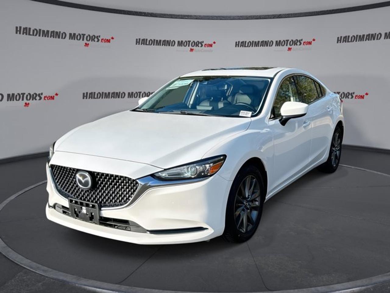 This Mazda Mazda6 has a powerful Gas 4cyl 2.5 L engine powering this Automatic transmission. Sunroof, Power Drivers Seat, Leather Seats, Lane Departure, Heated Steering Wheel.*This Mazda Mazda6 Features the Following Options *Heated Seats - Front, Blind Spot Monitoring, Apple Carplay, Android Auto, Adaptive Cruise, Wheels: 17, Transmission: SkiyActiv-Drive 6-Speed Automatic - manual shift mode and drive selection switch, Tires: 225/55R17, Tire Pressure Monitoring System Low Tire Pressure Warning, Smart Brake Support (SBS), Rear Cross Traffic Alert (RCTA), Radio: AM/FM/HD -6 speakers, 8 colour touchscreen display, HMI Commander switch, 4 USB ports (2 front, 2 rear), auxiliary audio input, steering wheel mounted Bluetooth and audio controls, navigation-ready, Bluetooth w/Audio Profile, Aha internet radio functionality, Stitcher internet radio functionality and SMS text message functionality Navigation requires navigation SD card accessory., Radio w/Seek-Scan, Clock, Speed Compensated Volume Control and Radio Data System, Mazda Radar Cruise Control (MRCC), Leatherette Upholstery.*Stop By Today *For a must-own Mazda Mazda6 come see us at Haldimand Motors Ltd., 42 Talbot St E, Cayuga, ON N0A 1E0. Just minutes away!