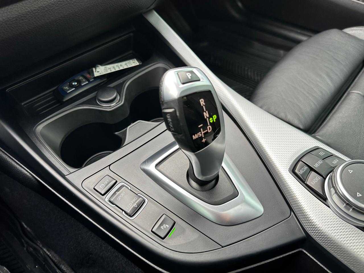 2015 BMW 2-Series 228i xDrive Heated-Leather Sunroof NAV Bluetooth Photo