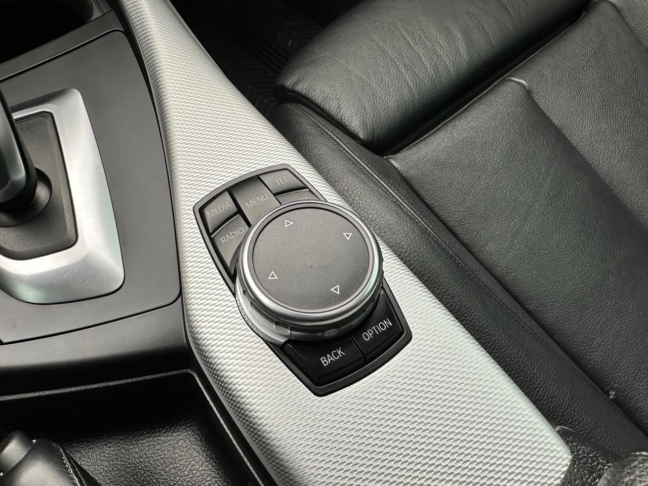 2015 BMW 2-Series 228i xDrive Heated-Leather Sunroof NAV Bluetooth Photo