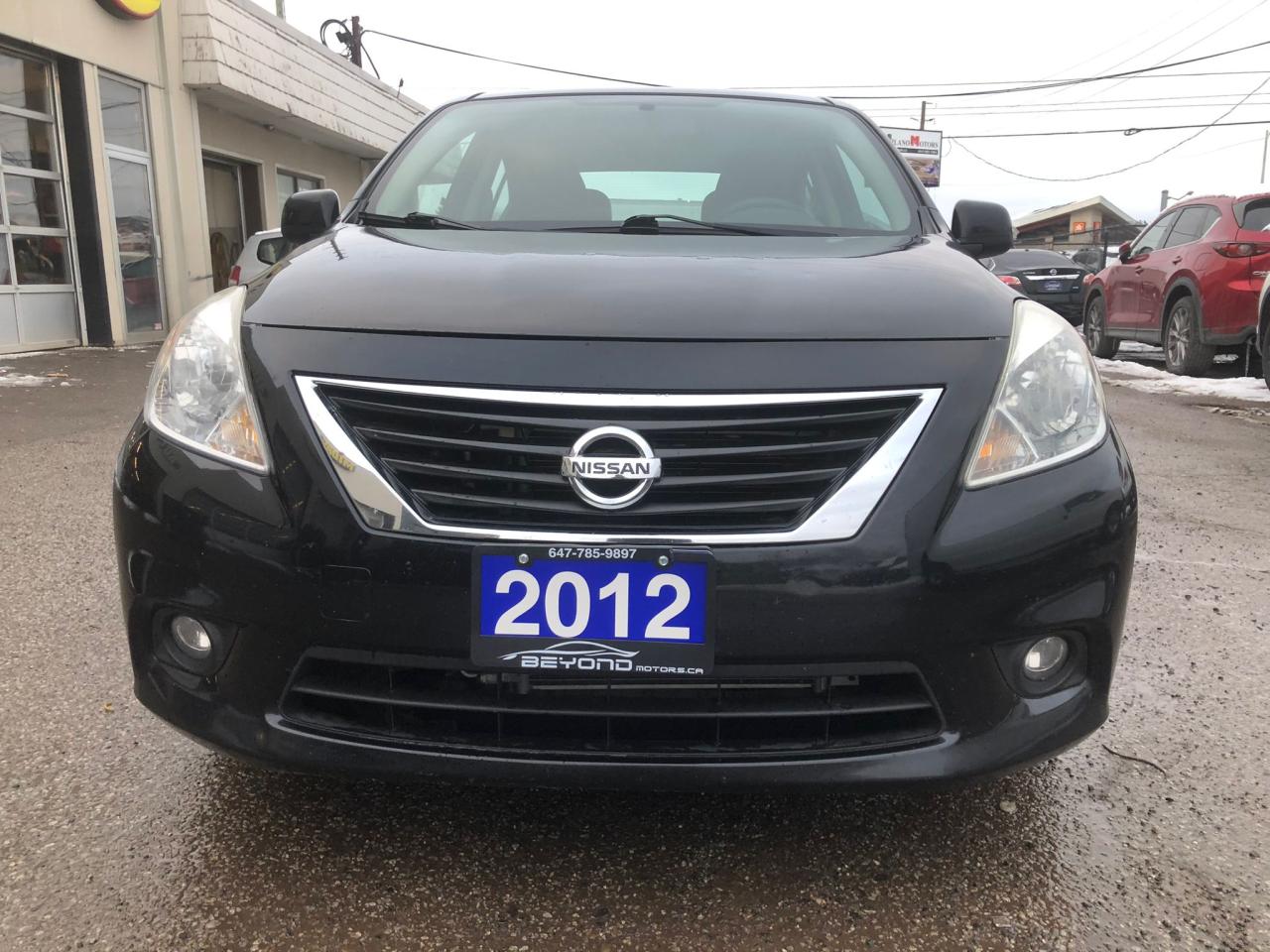 2012 Nissan Versa SL CERTIFIED WITH 3 YEARS WARRANTY INCLUDED.