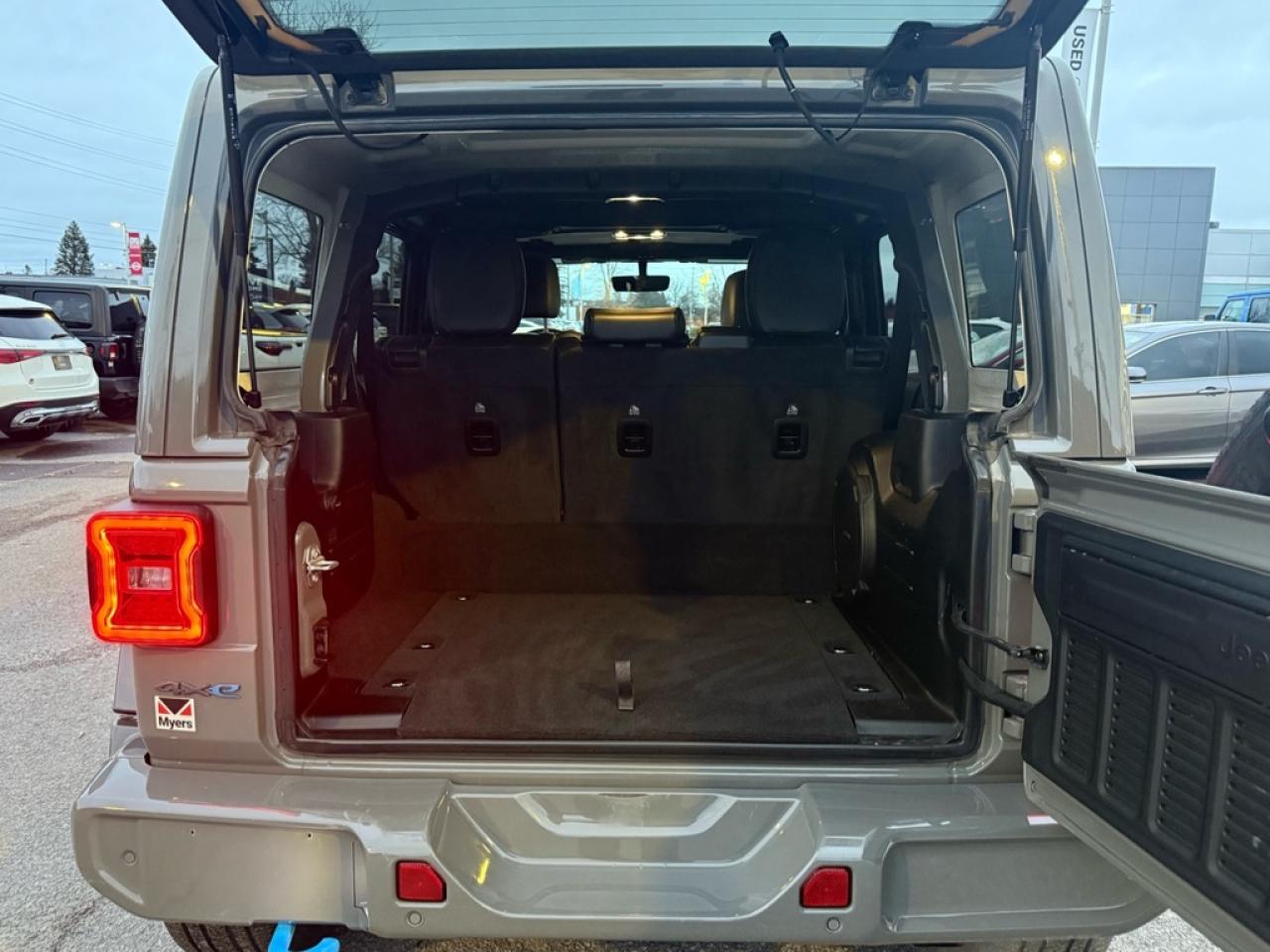 2023 Jeep Wrangler 4xe High Altitude  - Hybrid - $149.72 /Wk Photo