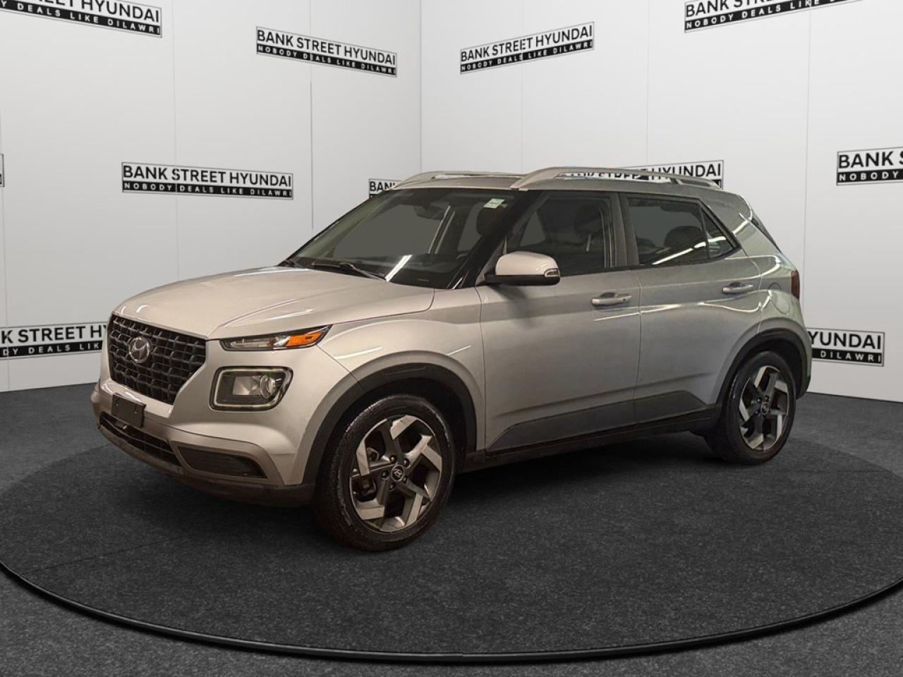 Get ready to turn heads with the 2021 Hyundai Venue Trend in a stunning silver finish. This front-wheel-drive SUV boasts nimble handling and a smooth automatic transmission, making it perfect for urban adventures and beyond. Step outside and admire the sleek, modern lines accentuated by alloy wheels and a stylish sunroof/moonroof. Inside, youll find an inviting cabin that combines practicality with comfort. Enjoy heated front seats, a leather steering wheel, and leather/metal-look gear shifter material that add a touch of luxury to your everyday drive. Technology is at your fingertips with smart device integration, Bluetooth connection, and a backup camera for safety and convenience. The Venue is equipped with advanced features like lane assist, brake assist, and remote start, ensuring a modern driving experience. Keyless entry and power windows enhance ease of use, and with a heated steering wheel, even winter mornings wont slow you down. The 2021 Hyundai Venue Trend IVT is the ideal choice for the modern urbanite looking for a reliable yet stylish ride. See how it fits your lifestyle by contacting our dealership today for more information and to book your test drive.