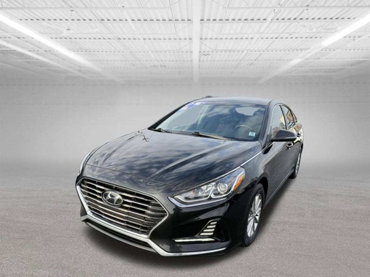 Steele Hyundai MVI and Ride. All MVI and Ride vehicles have been inspected and brought up to provincial motor vehicle inspection standards.We also change the oil as part of our process to get this vehicle ready for you.Warranty: There is a 30-day 50/50 split warranty on parts and labor on any motor vehicle inspection items.Please note items such as air conditioning & engine lights are not MVI related items.TRADE INS ARE WELCOME.PERFORMED NEW MVIREPLACED OIL AND FILTERREPLACED FRONT BRAKE PADSREPLACED FRONT BRAKE ROTORSREPLACED REAR BRAKE PADSREPLACED REAR BRAKE ROTORSREPLACED FRONT LEFT OUTER TIE ROD4 WHEEL ALIGNMENT2019 Hyundai Sonata EssentialThe 2019 Hyundai Sonata Essential delivers a comfortable, reliable, and fuel-efficient driving experience, making it an excellent choice for daily commuting and long highway drives. Powered by a smooth 2.4L 4-cylinder engine paired with an automatic transmission, this midsize sedan offers a great balance of performance and efficiency.Inside, the Sonata Essential features heated front seats, a rearview camera, Bluetooth connectivity, air conditioning, and steering-wheel-mounted controls for added convenience and safety. Its spacious interior and generous trunk provide plenty of room for passengers and cargo alike.Known for its strong safety ratings, comfort, and long-term dependability, the 2019 Hyundai Sonata Essential is a smart value option for drivers seeking a well-equipped sedan. Fully inspected and ready for the road, this Sonata is available now at Steele Hyundai.