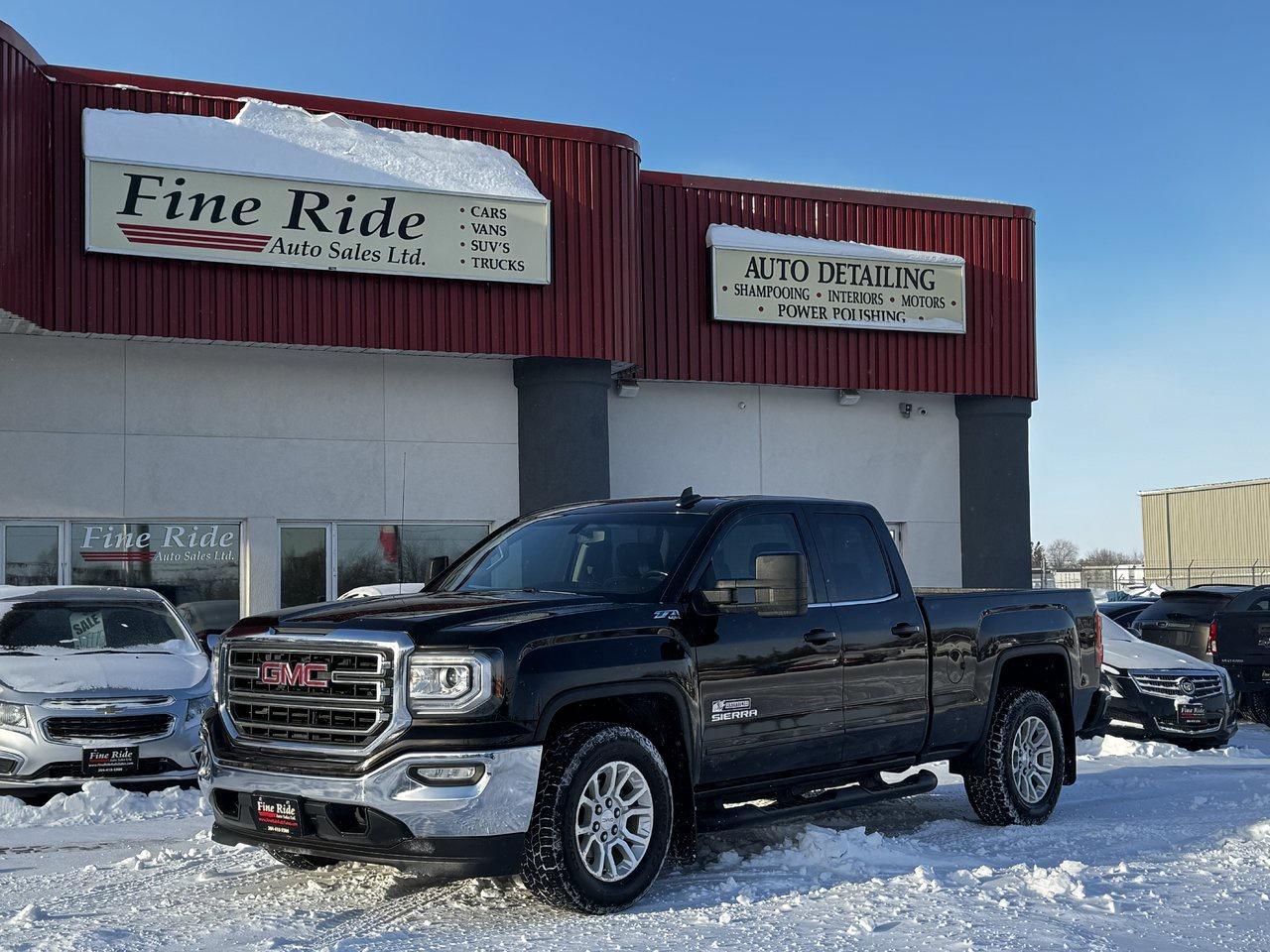 <p>2018 GMC Sierra 1500 SLE Double Cab 4X4 Kodiak Edition</p><p>5.3LTR V8<br>A/C<br>Tilt<br>Cruise<br>Power windows<br>Power locks<br>Power mirrors<br>Power seat (drivers)<br>Heated seats<br>6 passengers<br>AM/FM radio<br>MY LINK  /  Bluetooth<br>198,000kms!<br>Factory remote starter<br>Locking tail gate<br>Back up camera<br>Alloy wheels<br>Step bars<br>Fog lights<br>Original Manitoba truck!</p><p>GVW: 7,200LBS<br>Gear ratio: 3.42<br>Transmission: 6 speed, 6L80<br>Towing: Approximately 10,000LBS</p><p>$23,975 Safetied<br>Financing and Warranty Available at Fine Ride Auto Sales Ltd<br>www.FineRideAutoSales.ca</p><p>DLR# 4614<br>**Plus applicable taxes**</p><p></p><p><span style=color:#000000;><span style=font-family:book antiqua, palatino, serif;font-size:14pt;>Monday                9am to 6pm</span></span><br><span style=color:#000000;><span style=font-family:book antiqua, palatino, serif;font-size:14pt;>Tuesday               9am to 6pm</span></span><br><span style=color:#000000;><span style=font-family:book antiqua, palatino, serif;font-size:14pt;>Wednesday               9am to 6pm</span></span><br><span style=color:#000000;><span style=font-family:book antiqua, palatino, serif;font-size:14pt;>Thursday                9am to 6pm</span></span><br><span style=color:#000000;><span style=font-family:book antiqua, palatino, serif;font-size:14pt;>Friday                9am to 5pm</span></span><br><span style=color:#000000;><span style=font-family:book antiqua, palatino, serif;font-size:14pt;>Saturday                             10am to 2pm</span></span><br><span style=color:#000000;><span style=font-family:book antiqua, palatino, serif;font-size:14pt;>Sunday                    CLOSED</span></span></p>