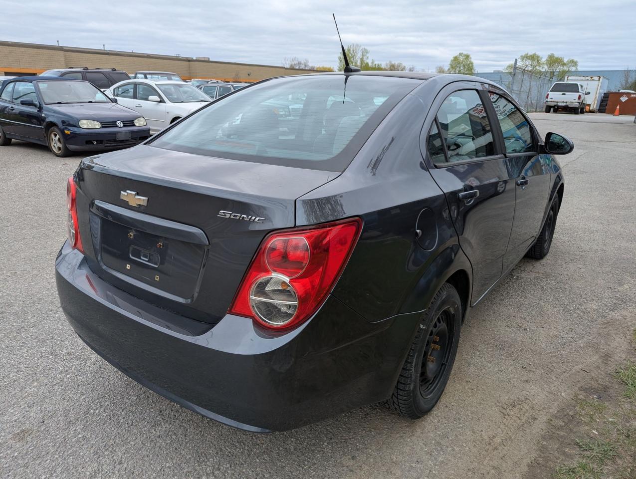 2013 Chevrolet Sonic "Gas MISER" certified + FREE 6M warranty Photo