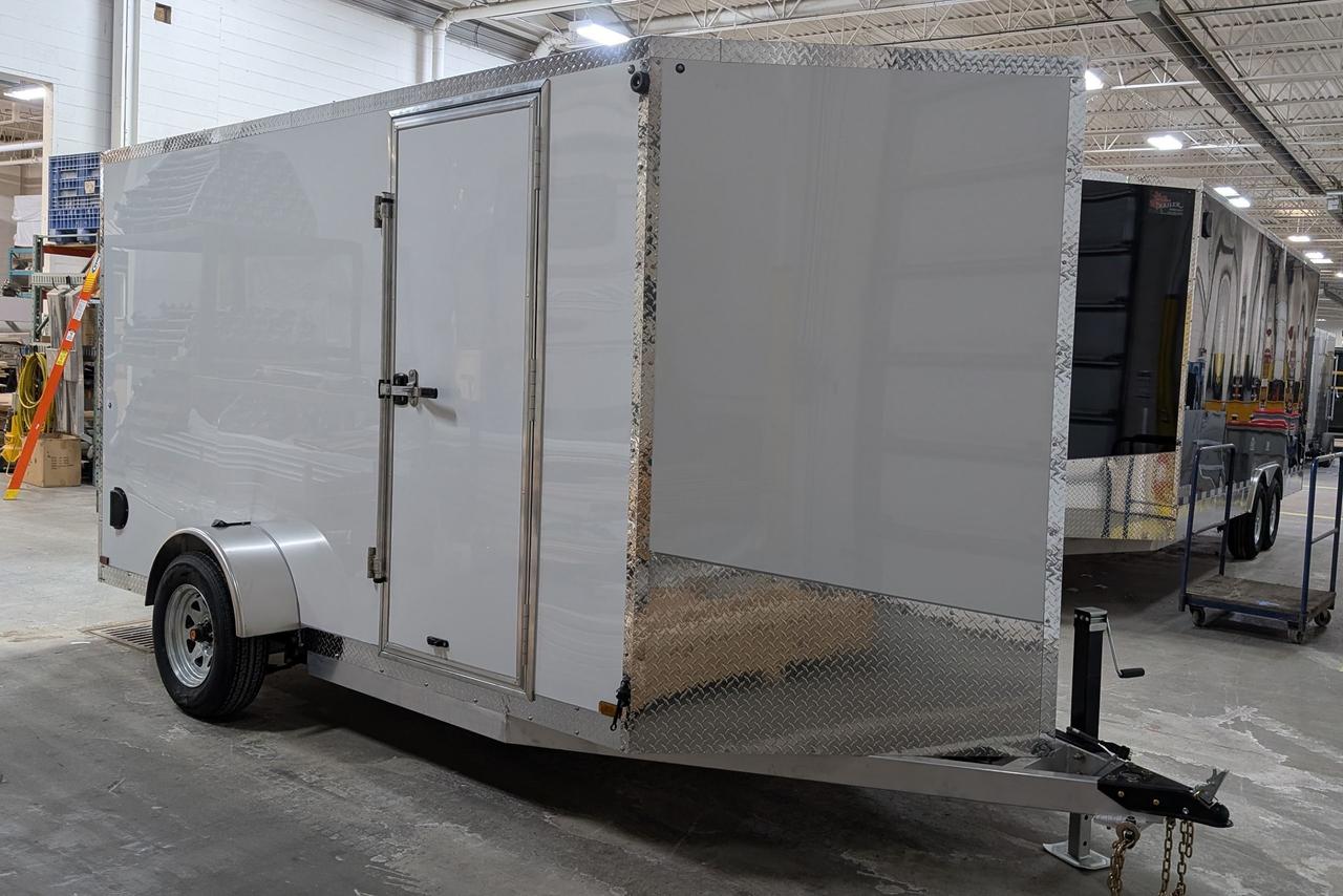 <p style=background-image: initial; background-position: initial; background-size: initial; background-repeat: initial; background-attachment: initial; background-origin: initial; background-clip: initial; border: 0px; margin: 0px; outline: 0px; padding: 0px; vertical-align: baseline; box-sizing: border-box; font: inherit; white-space-collapse: collapse;>2025&nbsp;Canadian Trailer Company 6x12&nbsp;Single Axle Cargo Trailer&nbsp;</p><p style=background-image: initial; background-position: initial; background-size: initial; background-repeat: initial; background-attachment: initial; background-origin: initial; background-clip: initial; border: 0px; margin: 0px; outline: 0px; padding: 0px; vertical-align: baseline; box-sizing: border-box; font: inherit; white-space-collapse: collapse;>&nbsp;</p><p style=background-image: initial; background-position: initial; background-size: initial; background-repeat: initial; background-attachment: initial; background-origin: initial; background-clip: initial; border: 0px; margin: 0px; outline: 0px; padding: 0px; vertical-align: baseline; box-sizing: border-box; font: inherit; white-space-collapse: collapse;><strong style=background-image: initial; background-position: initial; background-size: initial; background-repeat: initial; background-attachment: initial; background-origin: initial; background-clip: initial; border: 0px; margin: 0px; outline: 0px; padding: 0px; vertical-align: baseline; box-sizing: border-box;>Features include:</strong></p><ul style=background-image: initial; background-position: initial; background-size: initial; background-repeat: initial; background-attachment: initial; background-origin: initial; background-clip: initial; border: 0px; margin: 0px; outline: 0px; padding: 0px; vertical-align: baseline; list-style-position: initial; list-style-image: initial; box-sizing: border-box; padding-inline-start: 20px; padding-inline-end: revert; font: inherit; white-space-collapse: collapse;><li style=background-image: initial; background-position: initial; background-size: initial; background-repeat: initial; background-attachment: initial; background-origin: initial; background-clip: initial; border: 0px; margin: 0px; outline: 0px; padding: 0px; vertical-align: baseline; box-sizing: border-box; font: inherit;>Colour: White</li><li style=background-image: initial; background-position: initial; background-size: initial; background-repeat: initial; background-attachment: initial; background-origin: initial; background-clip: initial; border: 0px; margin: 0px; outline: 0px; padding: 0px; vertical-align: baseline; box-sizing: border-box; font: inherit;>Height: 66</li><li style=background-image: initial; background-position: initial; background-size: initial; background-repeat: initial; background-attachment: initial; background-origin: initial; background-clip: initial; border: 0px; margin: 0px; outline: 0px; padding: 0px; vertical-align: baseline; box-sizing: border-box; font: inherit;>3500 lb Dropped Axle</li><li style=background-image: initial; background-position: initial; background-size: initial; background-repeat: initial; background-attachment: initial; background-origin: initial; background-clip: initial; border: 0px; margin: 0px; outline: 0px; padding: 0px; vertical-align: baseline; box-sizing: border-box; font: inherit;>8000 lb jack</li><li style=background-image: initial; background-position: initial; background-size: initial; background-repeat: initial; background-attachment: initial; background-origin: initial; background-clip: initial; border: 0px; margin: 0px; outline: 0px; padding: 0px; vertical-align: baseline; box-sizing: border-box; font: inherit;>Rear ramp door</li><li style=background-image: initial; background-position: initial; background-size: initial; background-repeat: initial; background-attachment: initial; background-origin: initial; background-clip: initial; border: 0px; margin: 0px; outline: 0px; padding: 0px; vertical-align: baseline; box-sizing: border-box; font: inherit;>One-piece Translucent Fiberglass Roof</li><li style=background-image: initial; background-position: initial; background-size: initial; background-repeat: initial; background-attachment: initial; background-origin: initial; background-clip: initial; border: 0px; margin: 0px; outline: 0px; padding: 0px; vertical-align: baseline; box-sizing: border-box; font: inherit;>Warp-Resistant Composite Cladding</li><li style=background-image: initial; background-position: initial; background-size: initial; background-repeat: initial; background-attachment: initial; background-origin: initial; background-clip: initial; border: 0px; margin: 0px; outline: 0px; padding: 0px; vertical-align: baseline; box-sizing: border-box; font: inherit;>GPS Tracker with 1-year subscription</li><li style=background-image: initial; background-position: initial; background-size: initial; background-repeat: initial; background-attachment: initial; background-origin: initial; background-clip: initial; border: 0px; margin: 0px; outline: 0px; padding: 0px; vertical-align: baseline; box-sizing: border-box; font: inherit;>Aluminum Bar Lock with Stainless Steel Hasps (on rear doors and man door)</li><li style=background-image: initial; background-position: initial; background-size: initial; background-repeat: initial; background-attachment: initial; background-origin: initial; background-clip: initial; border: 0px; margin: 0px; outline: 0px; padding: 0px; vertical-align: baseline; box-sizing: border-box; font: inherit;>Weight: 670&nbsp;kg</li></ul><p style=background-image: initial; background-position: initial; background-size: initial; background-repeat: initial; background-attachment: initial; background-origin: initial; background-clip: initial; border: 0px; margin: 0px; outline: 0px; padding: 0px; vertical-align: baseline; box-sizing: border-box; font: inherit; white-space-collapse: collapse;>&nbsp;</p><p style=background-image: initial; background-position: initial; background-size: initial; background-repeat: initial; background-attachment: initial; background-origin: initial; background-clip: initial; border: 0px; margin: 0px; outline: 0px; padding: 0px; vertical-align: baseline; box-sizing: border-box; font: inherit; white-space-collapse: collapse;><strong style=background-image: initial; background-position: initial; background-size: initial; background-repeat: initial; background-attachment: initial; background-origin: initial; background-clip: initial; border: 0px; margin: 0px; outline: 0px; padding: 0px; vertical-align: baseline; box-sizing: border-box;>What makes a Canadian Trailer Company cargo trailer better than the competition?</strong></p><ul style=background-image: initial; background-position: initial; background-size: initial; background-repeat: initial; background-attachment: initial; background-origin: initial; background-clip: initial; border: 0px; margin: 0px; outline: 0px; padding: 0px; vertical-align: baseline; list-style-position: initial; list-style-image: initial; box-sizing: border-box; padding-inline-start: 20px; padding-inline-end: revert; font: inherit; white-space-collapse: collapse;><li style=background-image: initial; background-position: initial; background-size: initial; background-repeat: initial; background-attachment: initial; background-origin: initial; background-clip: initial; border: 0px; margin: 0px; outline: 0px; padding: 0px; vertical-align: baseline; box-sizing: border-box; font: inherit;>HD 3/16 A-frame&nbsp;<strong style=background-image: initial; background-position: initial; background-size: initial; background-repeat: initial; background-attachment: initial; background-origin: initial; background-clip: initial; border: 0px; margin: 0px; outline: 0px; padding: 0px; vertical-align: baseline; box-sizing: border-box;>STANDARD&nbsp;</strong>&ndash;&nbsp;<strong style=background-image: initial; background-position: initial; background-size: initial; background-repeat: initial; background-attachment: initial; background-origin: initial; background-clip: initial; border: 0px; margin: 0px; outline: 0px; padding: 0px; vertical-align: baseline; box-sizing: border-box;>50% THICKER</strong>&nbsp;plus centre pole&nbsp;<strong style=background-image: initial; background-position: initial; background-size: initial; background-repeat: initial; background-attachment: initial; background-origin: initial; background-clip: initial; border: 0px; margin: 0px; outline: 0px; padding: 0px; vertical-align: baseline; box-sizing: border-box;>STANDARD&nbsp;</strong>(Competition: 1/8&rdquo; A-frame)</li><li style=background-image: initial; background-position: initial; background-size: initial; background-repeat: initial; background-attachment: initial; background-origin: initial; background-clip: initial; border: 0px; margin: 0px; outline: 0px; padding: 0px; vertical-align: baseline; box-sizing: border-box; font: inherit;>Side runners extend to back wheel wells&nbsp;<strong style=background-image: initial; background-position: initial; background-size: initial; background-repeat: initial; background-attachment: initial; background-origin: initial; background-clip: initial; border: 0px; margin: 0px; outline: 0px; padding: 0px; vertical-align: baseline; box-sizing: border-box;>STANDARD&nbsp;</strong>(Competition: N/A)</li><li style=background-image: initial; background-position: initial; background-size: initial; background-repeat: initial; background-attachment: initial; background-origin: initial; background-clip: initial; border: 0px; margin: 0px; outline: 0px; padding: 0px; vertical-align: baseline; box-sizing: border-box; font: inherit;>HD &frac12;&rdquo; A-frame plate with Heavy Duty Clevis & Grade 7 chains/hooks&nbsp;<strong style=background-image: initial; background-position: initial; background-size: initial; background-repeat: initial; background-attachment: initial; background-origin: initial; background-clip: initial; border: 0px; margin: 0px; outline: 0px; padding: 0px; vertical-align: baseline; box-sizing: border-box;>STANDARD&nbsp;</strong>(Competition: No A-frame plate, industry standard chain/hooks, no clevis)</li><li style=background-image: initial; background-position: initial; background-size: initial; background-repeat: initial; background-attachment: initial; background-origin: initial; background-clip: initial; border: 0px; margin: 0px; outline: 0px; padding: 0px; vertical-align: baseline; box-sizing: border-box; font: inherit;>Roof, walls & floor - studs 16&rdquo; on centre , 1/8&rdquo; tube&nbsp;<strong style=background-image: initial; background-position: initial; background-size: initial; background-repeat: initial; background-attachment: initial; background-origin: initial; background-clip: initial; border: 0px; margin: 0px; outline: 0px; padding: 0px; vertical-align: baseline; box-sizing: border-box;>STANDARD &ndash; built for Canadian snow load</strong>&nbsp;(Competition: studs 16&rdquo;-24&rdquo; roof, walls, floor)</li><li style=background-image: initial; background-position: initial; background-size: initial; background-repeat: initial; background-attachment: initial; background-origin: initial; background-clip: initial; border: 0px; margin: 0px; outline: 0px; padding: 0px; vertical-align: baseline; box-sizing: border-box; font: inherit;>Ramp Door included&nbsp;<strong style=background-image: initial; background-position: initial; background-size: initial; background-repeat: initial; background-attachment: initial; background-origin: initial; background-clip: initial; border: 0px; margin: 0px; outline: 0px; padding: 0px; vertical-align: baseline; box-sizing: border-box;>STANDARD&nbsp;</strong>(Competition: Upgrade cost $$$)</li><li style=background-image: initial; background-position: initial; background-size: initial; background-repeat: initial; background-attachment: initial; background-origin: initial; background-clip: initial; border: 0px; margin: 0px; outline: 0px; padding: 0px; vertical-align: baseline; box-sizing: border-box; font: inherit;>Stainless Steel screws, nuts, bolts, washers&nbsp;<strong style=background-image: initial; background-position: initial; background-size: initial; background-repeat: initial; background-attachment: initial; background-origin: initial; background-clip: initial; border: 0px; margin: 0px; outline: 0px; padding: 0px; vertical-align: baseline; box-sizing: border-box;>STANDARD&nbsp;</strong>&ndash; where applicable (Competition: Steel)</li><li style=background-image: initial; background-position: initial; background-size: initial; background-repeat: initial; background-attachment: initial; background-origin: initial; background-clip: initial; border: 0px; margin: 0px; outline: 0px; padding: 0px; vertical-align: baseline; box-sizing: border-box; font: inherit;>Interior &ndash; &frac12;&rdquo; plywood walls, &frac34;&rdquo; plywood floor, finished one side&nbsp;<strong style=background-image: initial; background-position: initial; background-size: initial; background-repeat: initial; background-attachment: initial; background-origin: initial; background-clip: initial; border: 0px; margin: 0px; outline: 0px; padding: 0px; vertical-align: baseline; box-sizing: border-box;>STANDARD&nbsp;</strong>(Competition: 3/8&rdquo; Drymax/Chipboard walls & &frac34;&rdquo; Drymax/Chipboard floor)</li><li style=background-image: initial; background-position: initial; background-size: initial; background-repeat: initial; background-attachment: initial; background-origin: initial; background-clip: initial; border: 0px; margin: 0px; outline: 0px; padding: 0px; vertical-align: baseline; box-sizing: border-box; font: inherit;>All interior trimmed out &ndash; floor, ceiling, corners&nbsp;<strong style=background-image: initial; background-position: initial; background-size: initial; background-repeat: initial; background-attachment: initial; background-origin: initial; background-clip: initial; border: 0px; margin: 0px; outline: 0px; padding: 0px; vertical-align: baseline; box-sizing: border-box;>STANDARD&nbsp;</strong>(Competition: no trim on most)</li><li style=background-image: initial; background-position: initial; background-size: initial; background-repeat: initial; background-attachment: initial; background-origin: initial; background-clip: initial; border: 0px; margin: 0px; outline: 0px; padding: 0px; vertical-align: baseline; box-sizing: border-box; font: inherit;>45-degree angle nose - excellent fuel economy&nbsp;<strong style=background-image: initial; background-position: initial; background-size: initial; background-repeat: initial; background-attachment: initial; background-origin: initial; background-clip: initial; border: 0px; margin: 0px; outline: 0px; padding: 0px; vertical-align: baseline; box-sizing: border-box;>STANDARD&nbsp;</strong>(Competition: Short/flat nose)</li><li style=background-image: initial; background-position: initial; background-size: initial; background-repeat: initial; background-attachment: initial; background-origin: initial; background-clip: initial; border: 0px; margin: 0px; outline: 0px; padding: 0px; vertical-align: baseline; box-sizing: border-box; font: inherit;>Screwless smooth exterior cladding&nbsp;<strong style=background-image: initial; background-position: initial; background-size: initial; background-repeat: initial; background-attachment: initial; background-origin: initial; background-clip: initial; border: 0px; margin: 0px; outline: 0px; padding: 0px; vertical-align: baseline; box-sizing: border-box;>STANDARD&nbsp;</strong>(Competition: Cladding full of screws/rivets that pop/rust)</li><li style=background-image: initial; background-position: initial; background-size: initial; background-repeat: initial; background-attachment: initial; background-origin: initial; background-clip: initial; border: 0px; margin: 0px; outline: 0px; padding: 0px; vertical-align: baseline; box-sizing: border-box; font: inherit;>3 Year limited warranty&nbsp;<strong style=background-image: initial; background-position: initial; background-size: initial; background-repeat: initial; background-attachment: initial; background-origin: initial; background-clip: initial; border: 0px; margin: 0px; outline: 0px; padding: 0px; vertical-align: baseline; box-sizing: border-box;>STANDARD&nbsp;</strong>(Competition: most 1 year)</li><li style=background-image: initial; background-position: initial; background-size: initial; background-repeat: initial; background-attachment: initial; background-origin: initial; background-clip: initial; border: 0px; margin: 0px; outline: 0px; padding: 0px; vertical-align: baseline; box-sizing: border-box; font: inherit;>Buy direct from the manufacturer &ndash; no added expense pushed to the customer (Competition: Dealer/Distributor/Broker)</li></ul><p style=background-image: initial; background-position: initial; background-size: initial; background-repeat: initial; background-attachment: initial; background-origin: initial; background-clip: initial; border: 0px; margin: 0px; outline: 0px; padding: 0px; vertical-align: baseline; box-sizing: border-box; font: inherit; white-space-collapse: collapse;>&nbsp;</p><p style=background-image: initial; background-position: initial; background-size: initial; background-repeat: initial; background-attachment: initial; background-origin: initial; background-clip: initial; border: 0px; margin: 0px; outline: 0px; padding: 0px; vertical-align: baseline; box-sizing: border-box; font: inherit; white-space-collapse: collapse;>Taxes & fees additional. This trailer is currently located at the Canadian Trailer Company factory, Goderich.</p>