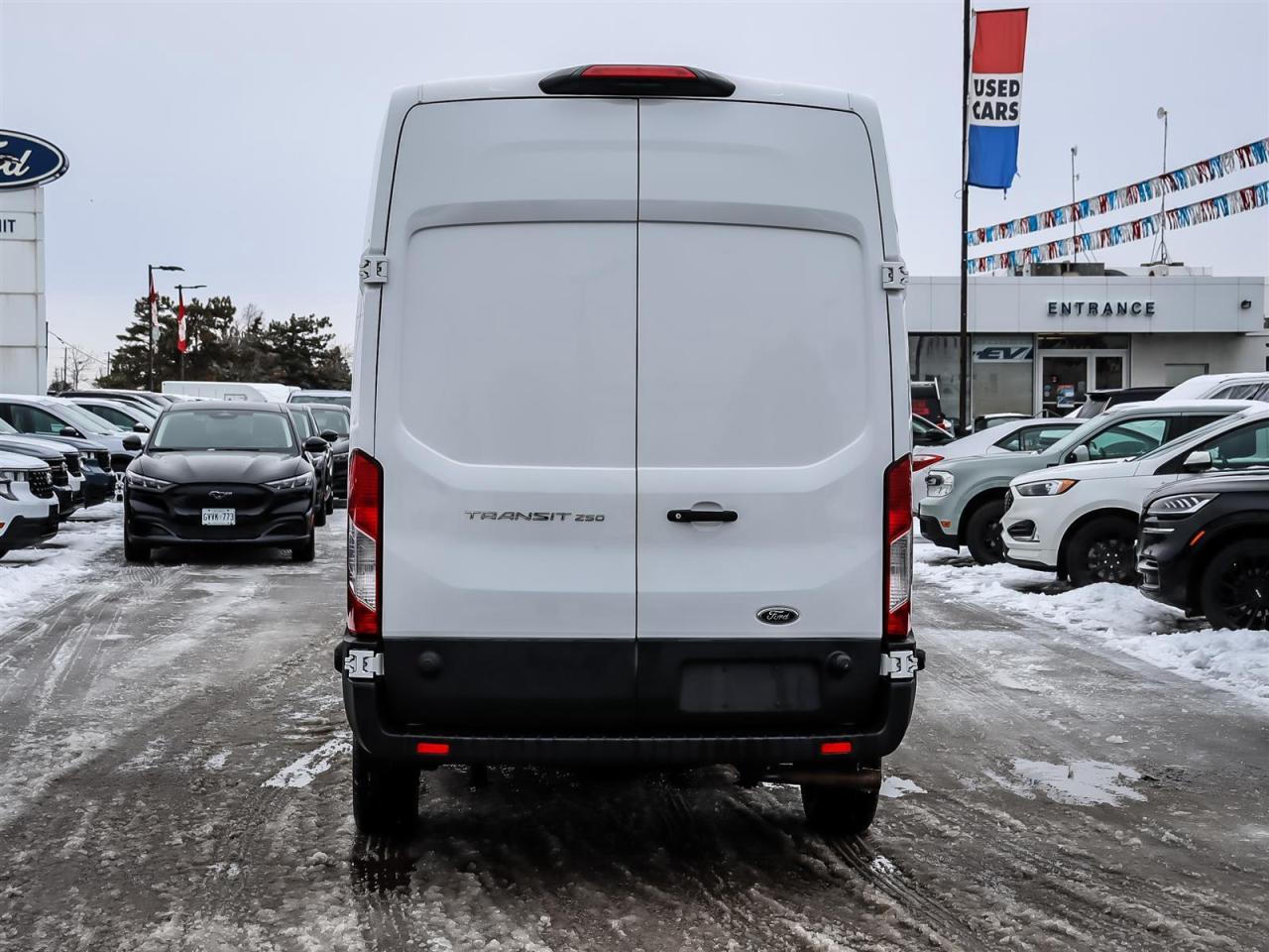 2024 Ford Transit 250 Partition Lockable Door | Vinyl Floor | Protective Walls | High Roof | Photo