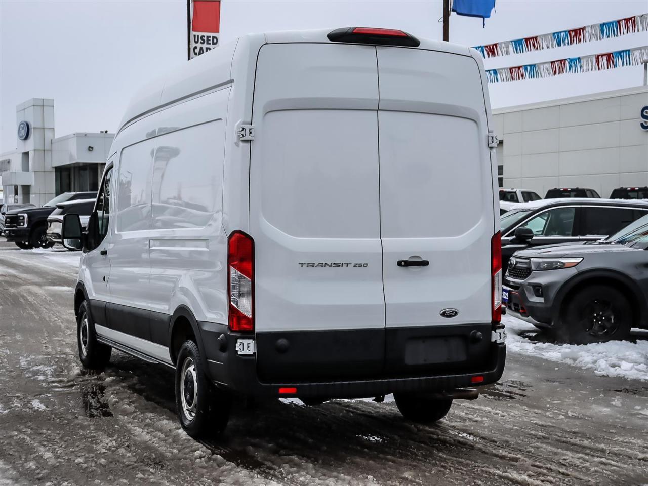 2024 Ford Transit 250 Partition Lockable Door | Vinyl Floor | Protective Walls | High Roof | Photo
