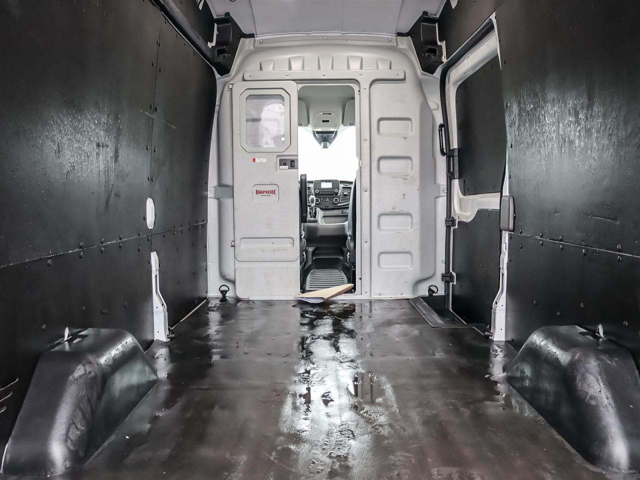 2024 Ford Transit 250 Partition Lockable Door | Vinyl Floor | Protective Walls | High Roof | Photo