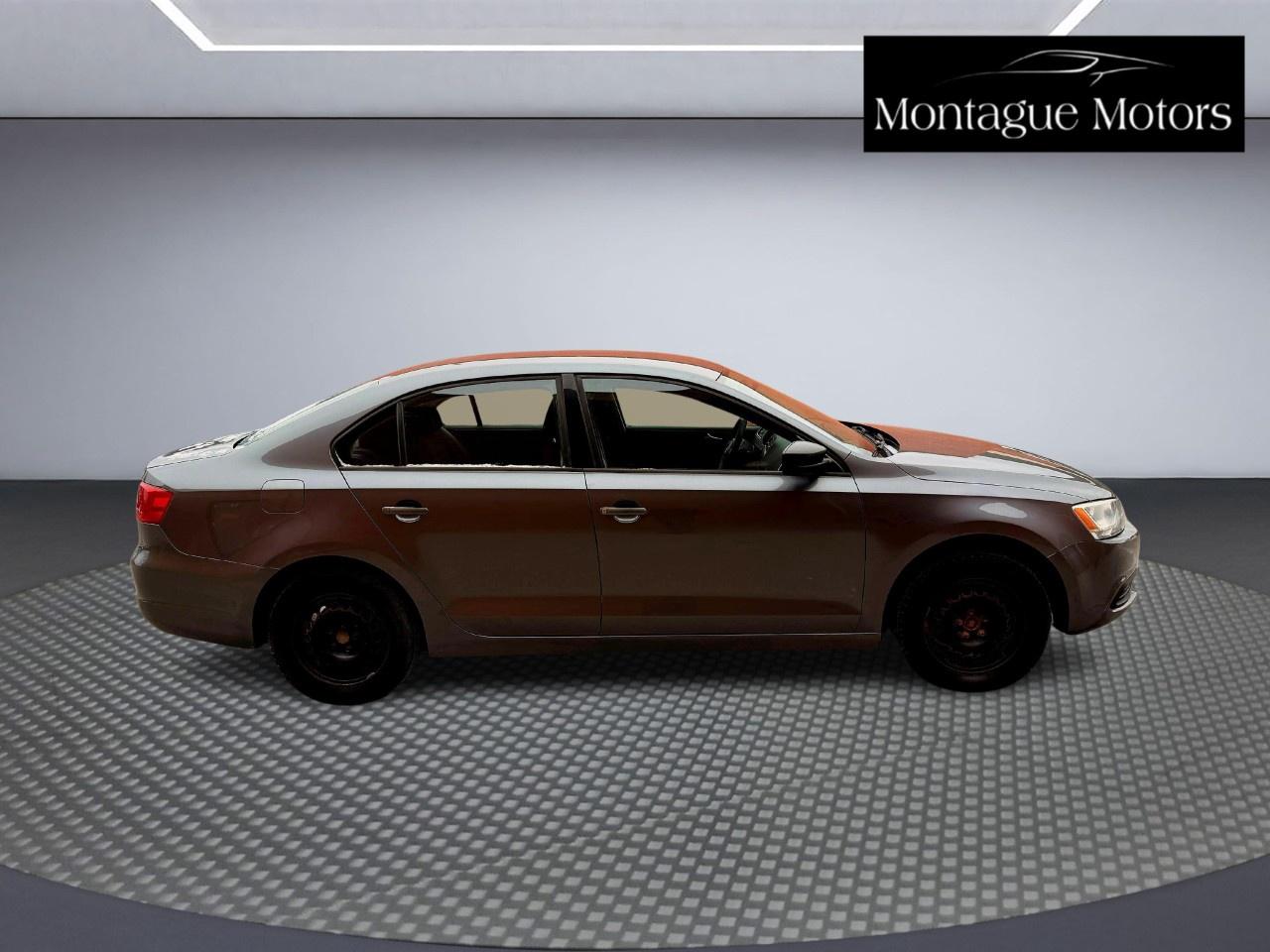 2012 Volkswagen Jetta Sedan 4DR 2.0L MAN TRENDLINE Photo