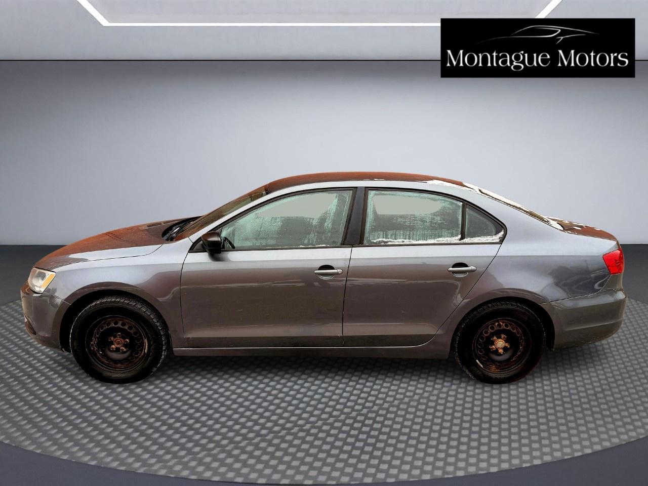 2012 Volkswagen Jetta Sedan 4DR 2.0L MAN TRENDLINE Photo